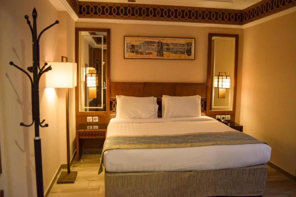 Bed in Violet Al Azizia Hotel MASJID Al Qatari