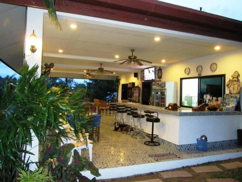 Communal lounge/ TV room in D&K Smiley Phuket Resort