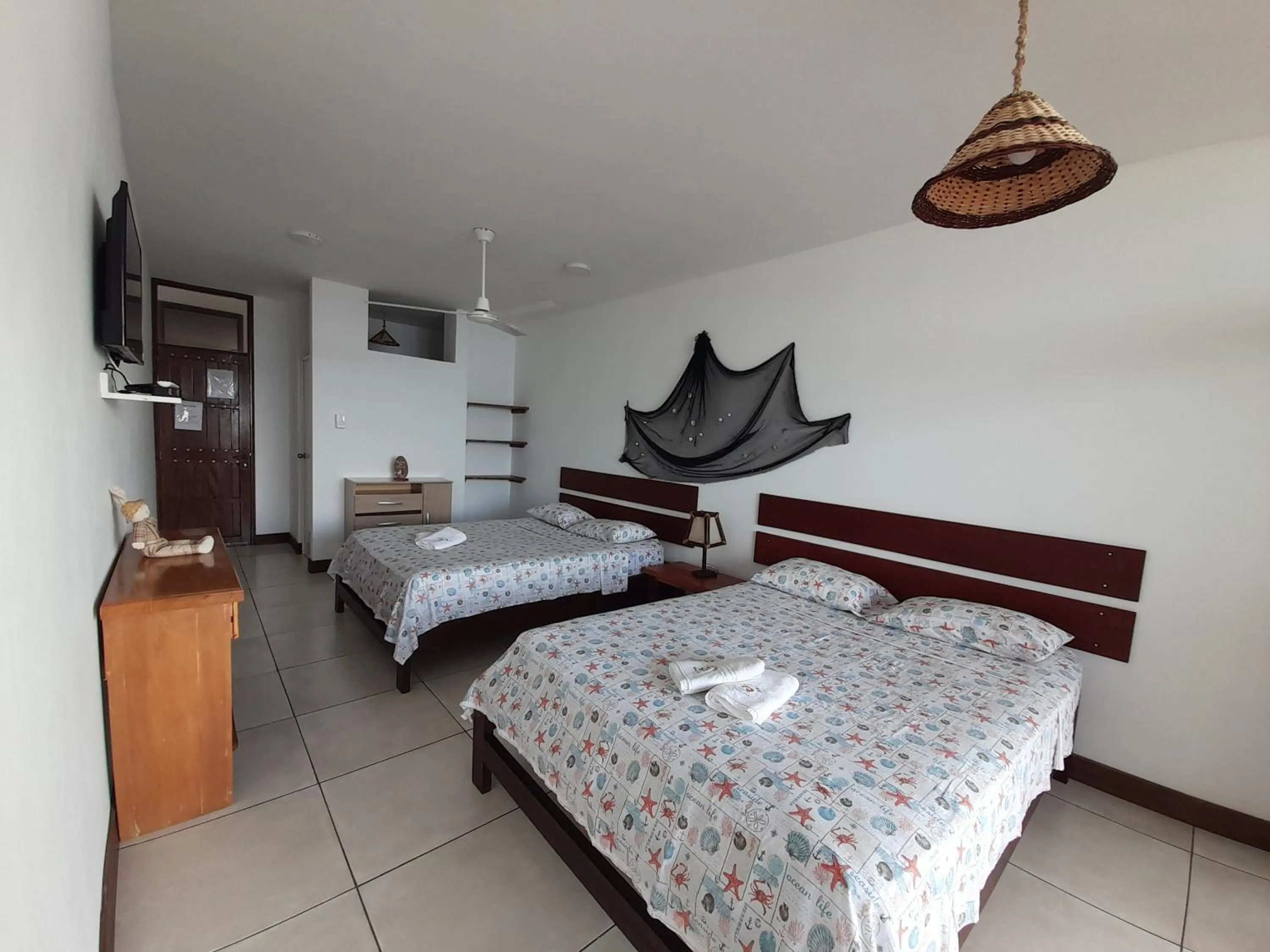 Photo of the whole room, Bed in Maria Jose Bungalows