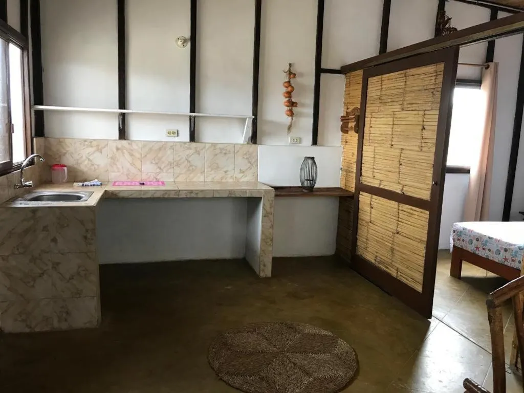 Kitchen or kitchenette in Maria Jose Bungalows