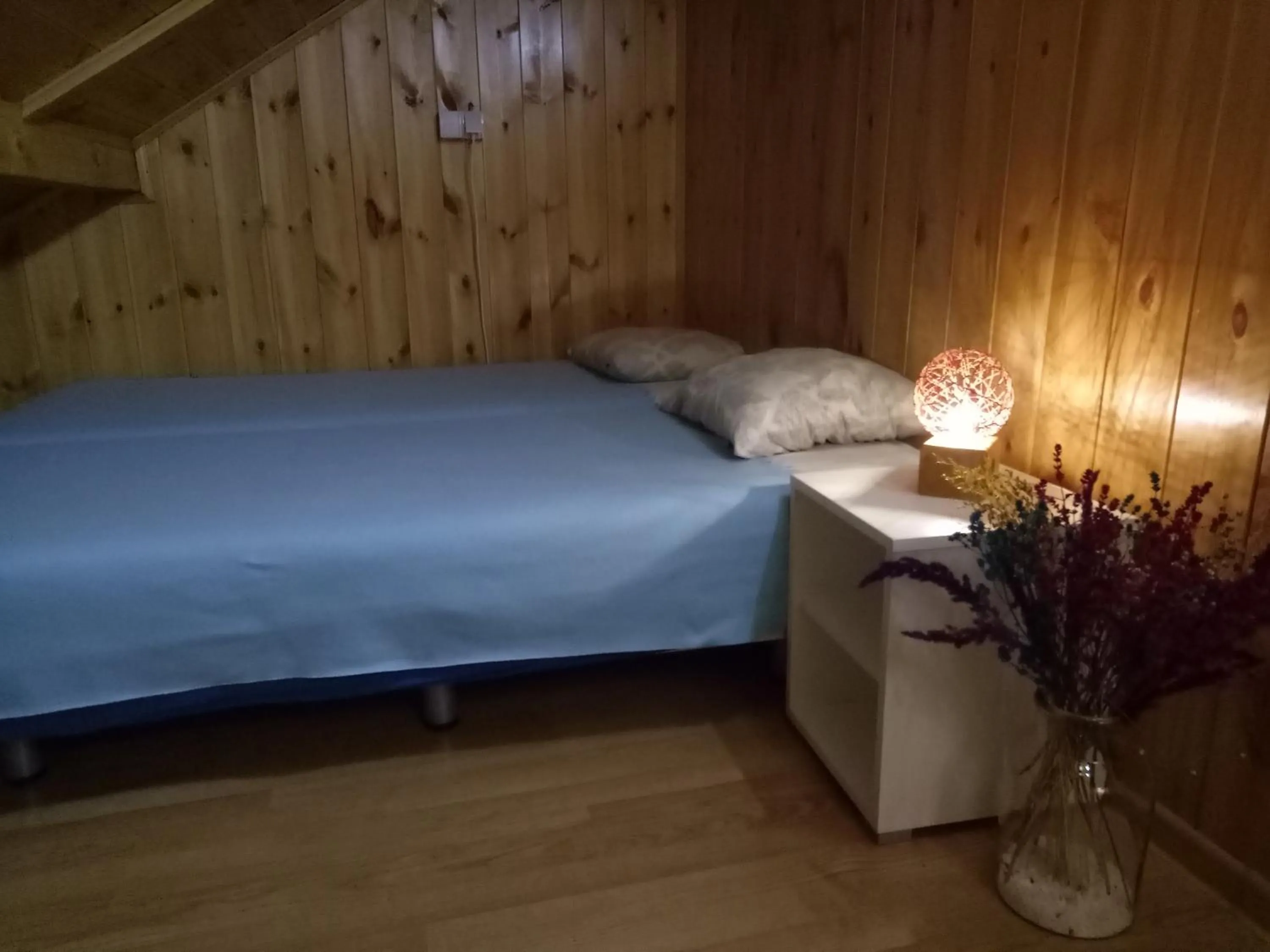 Bed in Tiki Apartmen