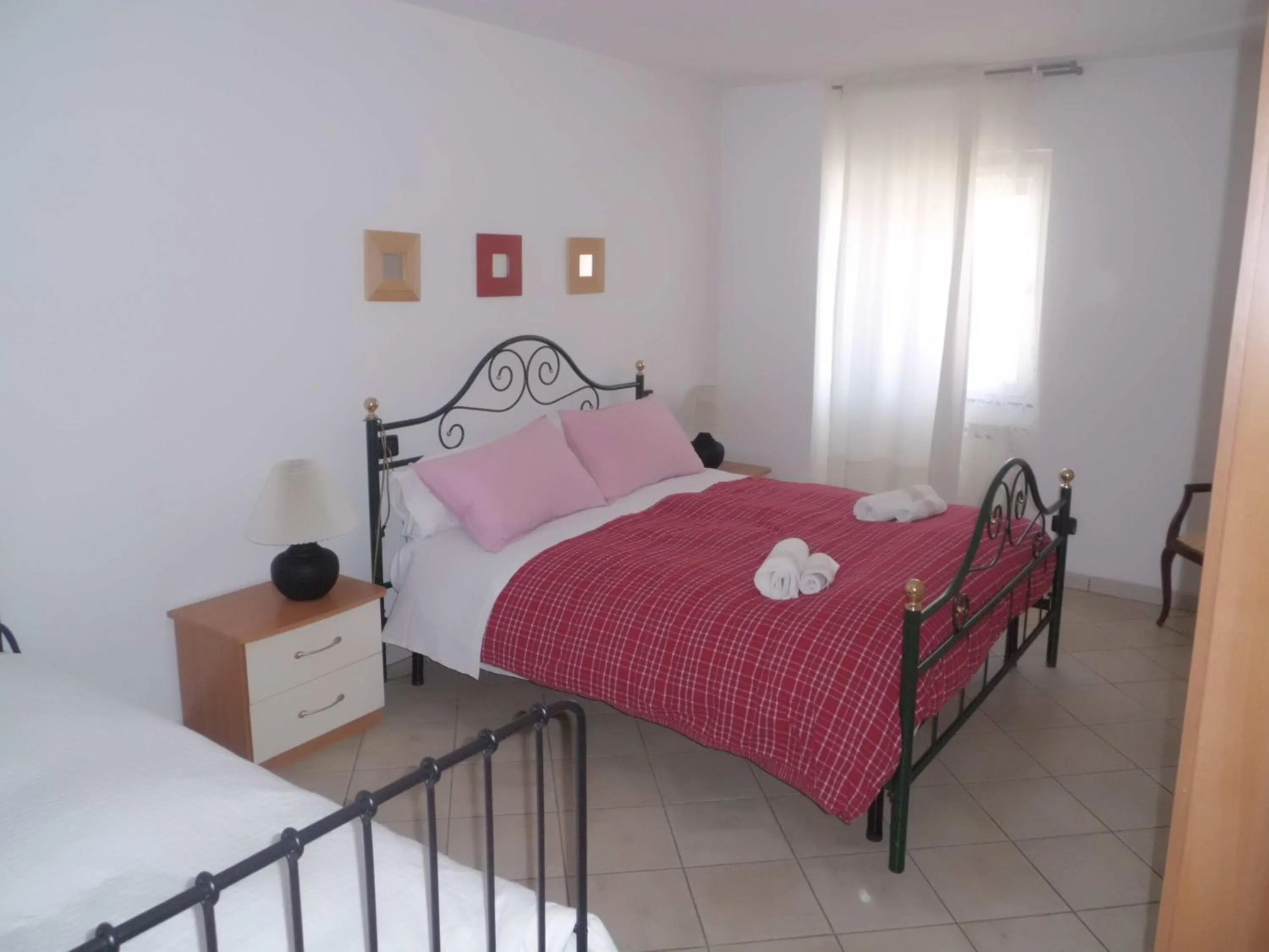 Photo of the whole room, Bed in Casa Fattorini