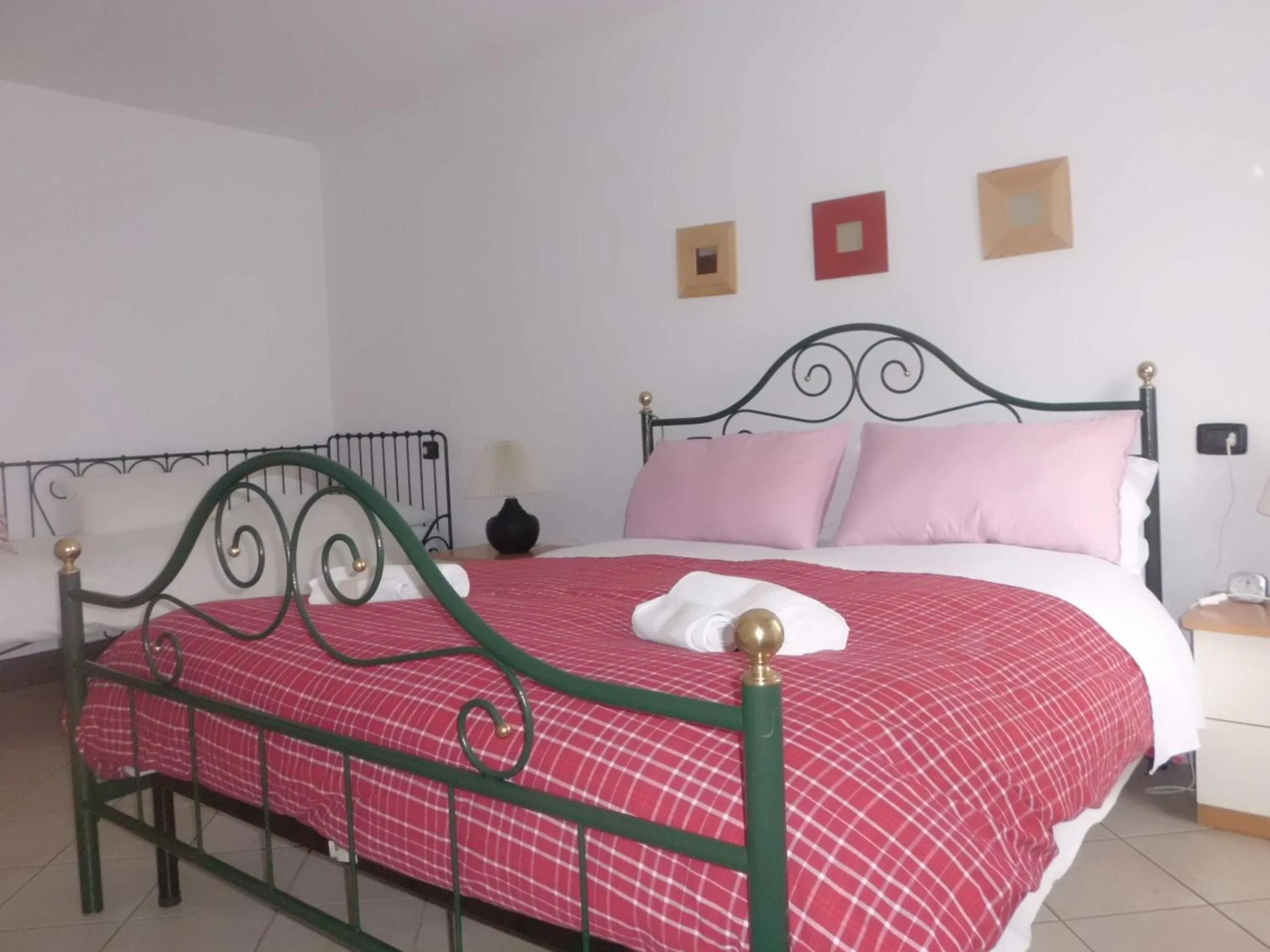 Photo of the whole room, Bed in Casa Fattorini