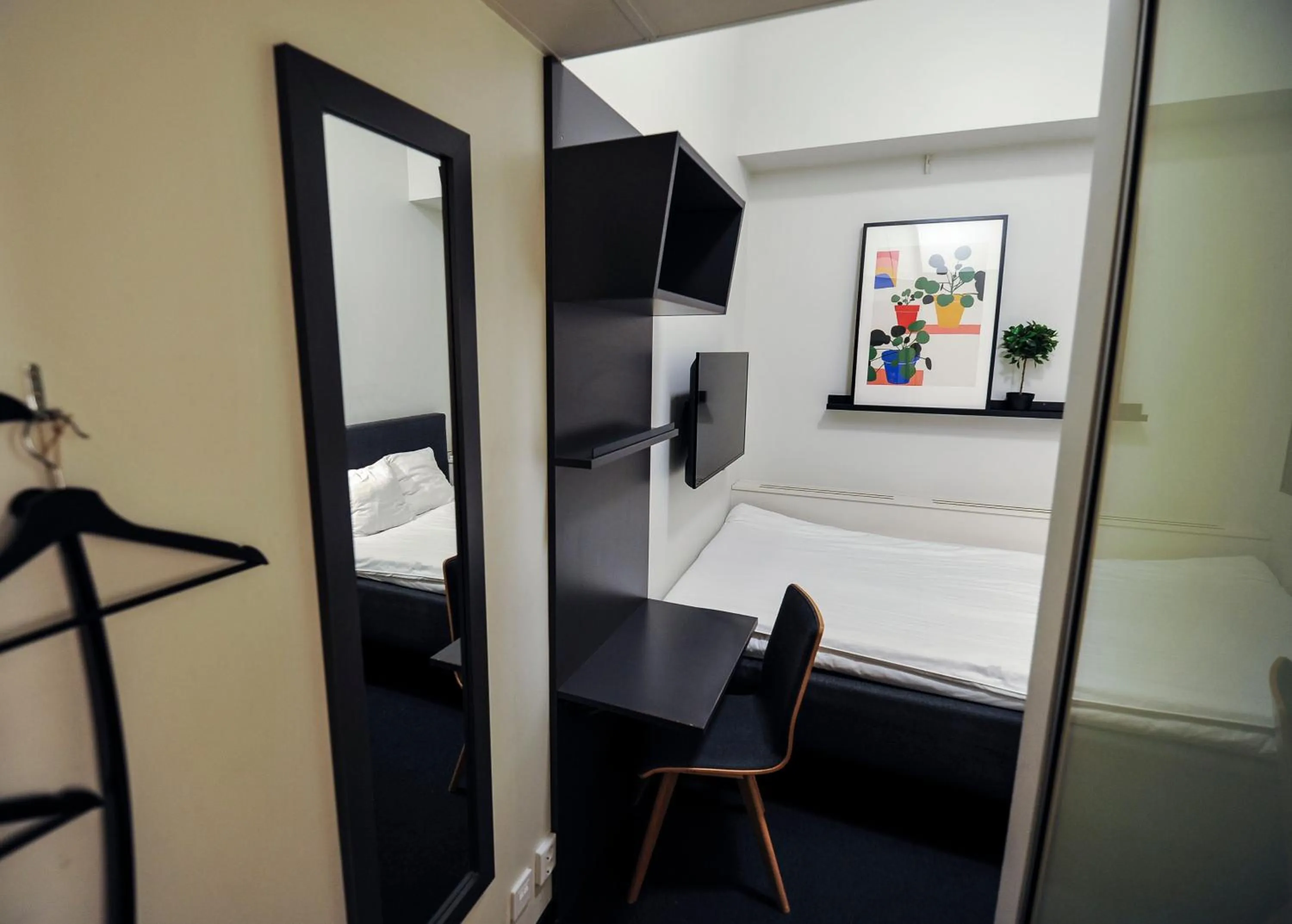 Bed in Moment Hotels