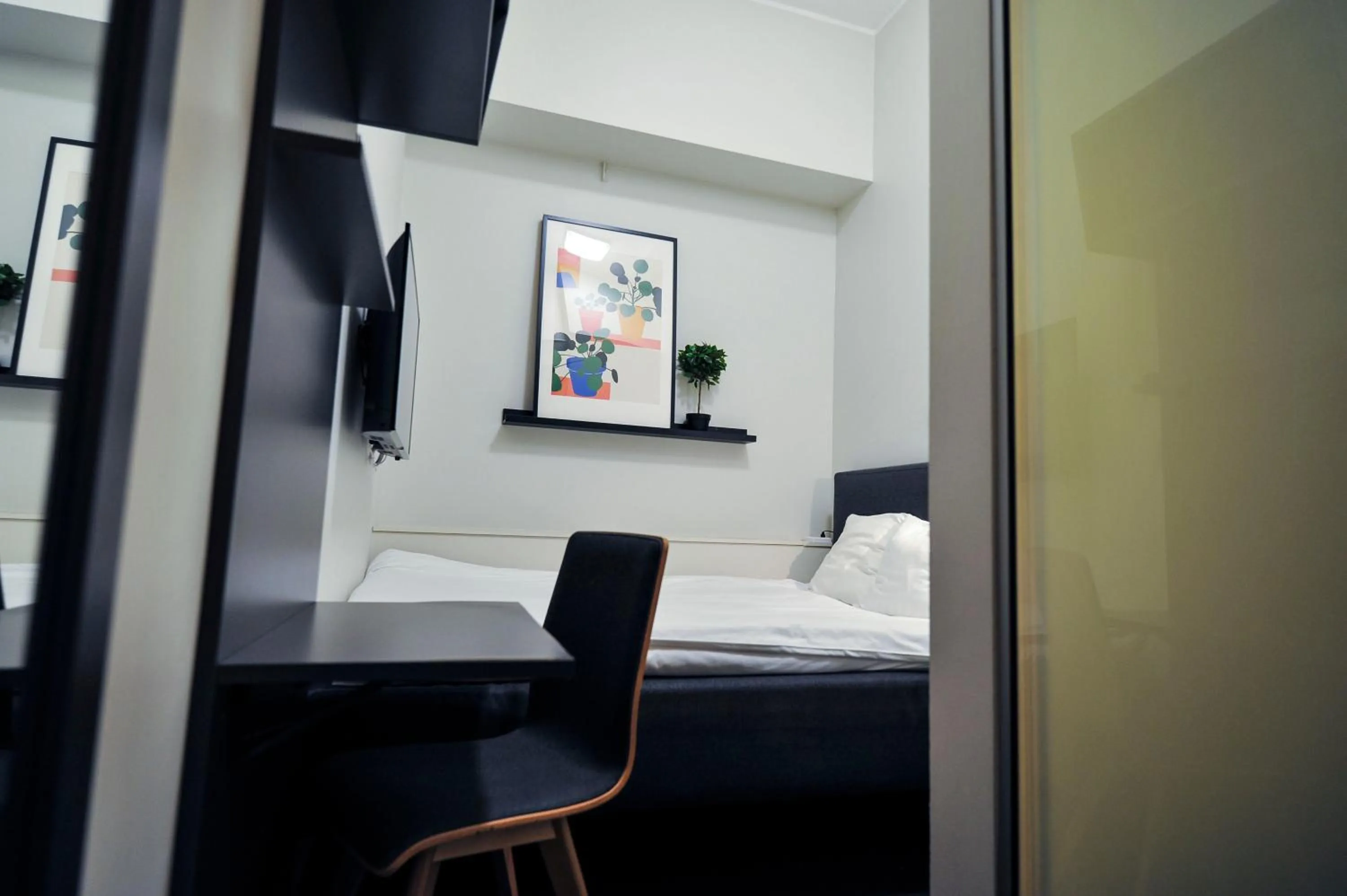 Bed in Moment Hotels