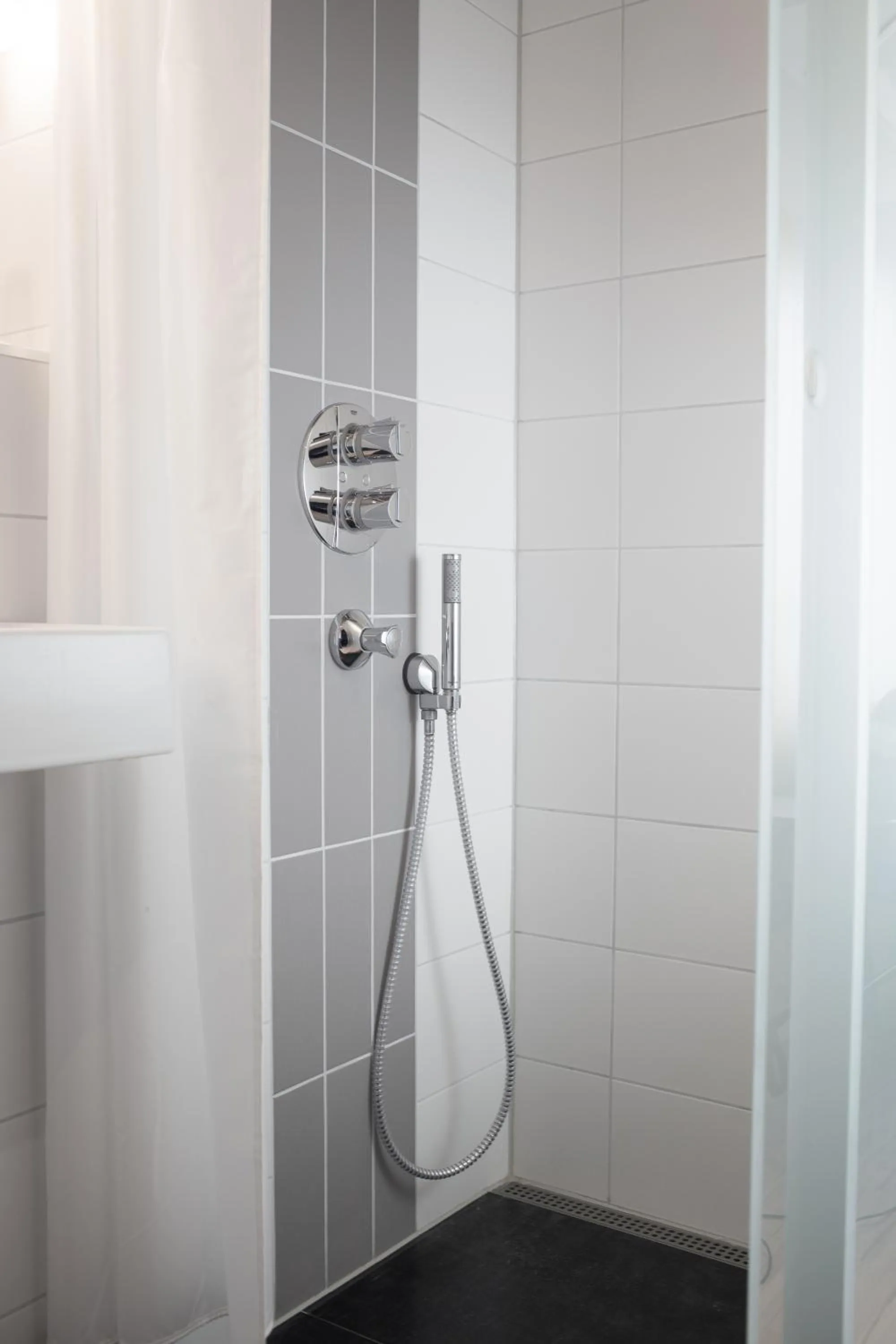 Shower in Moment Hotels