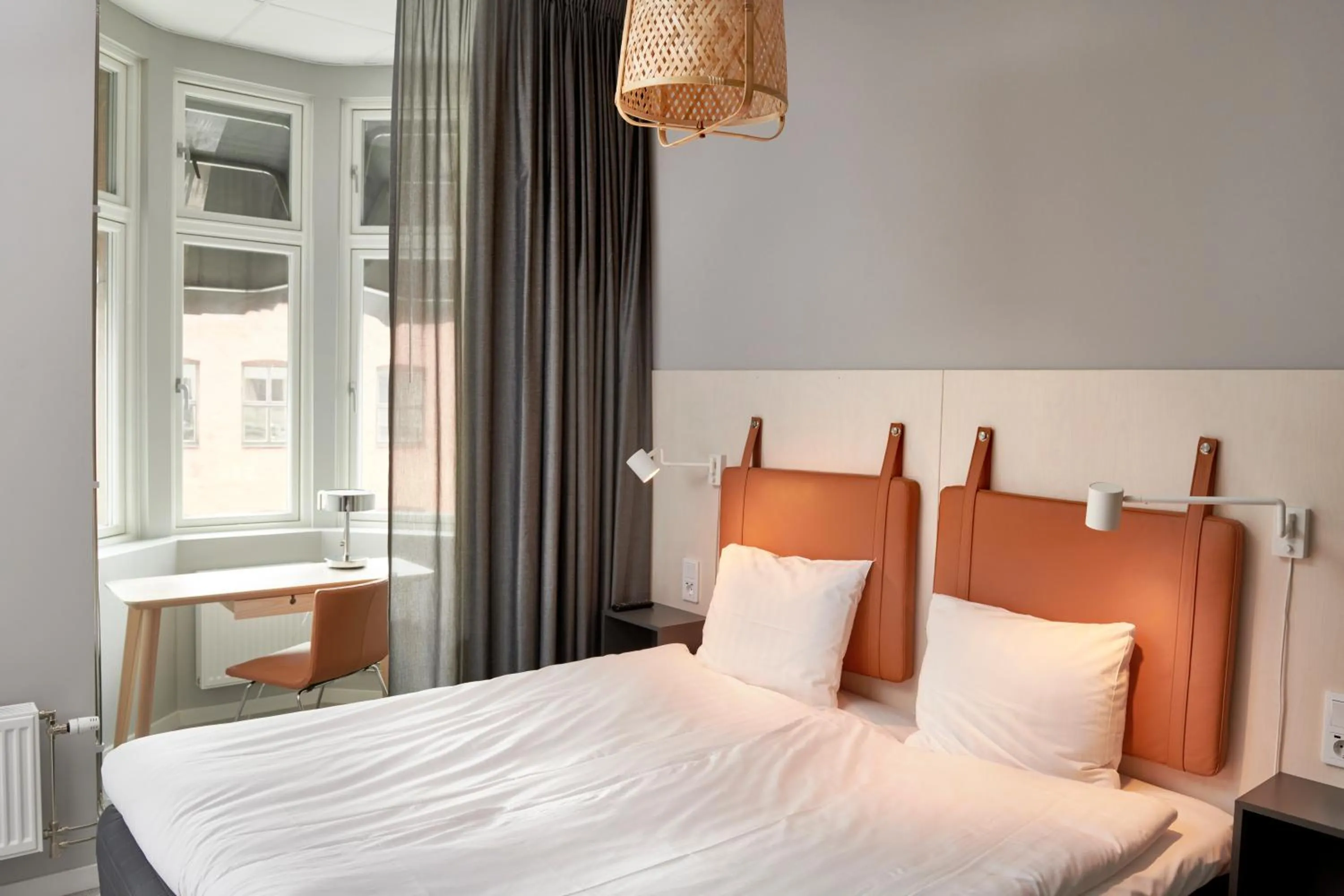 Bed in Moment Hotels