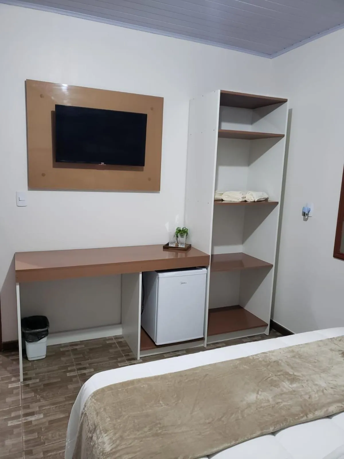 Bed in Pousada Família Cordeiro