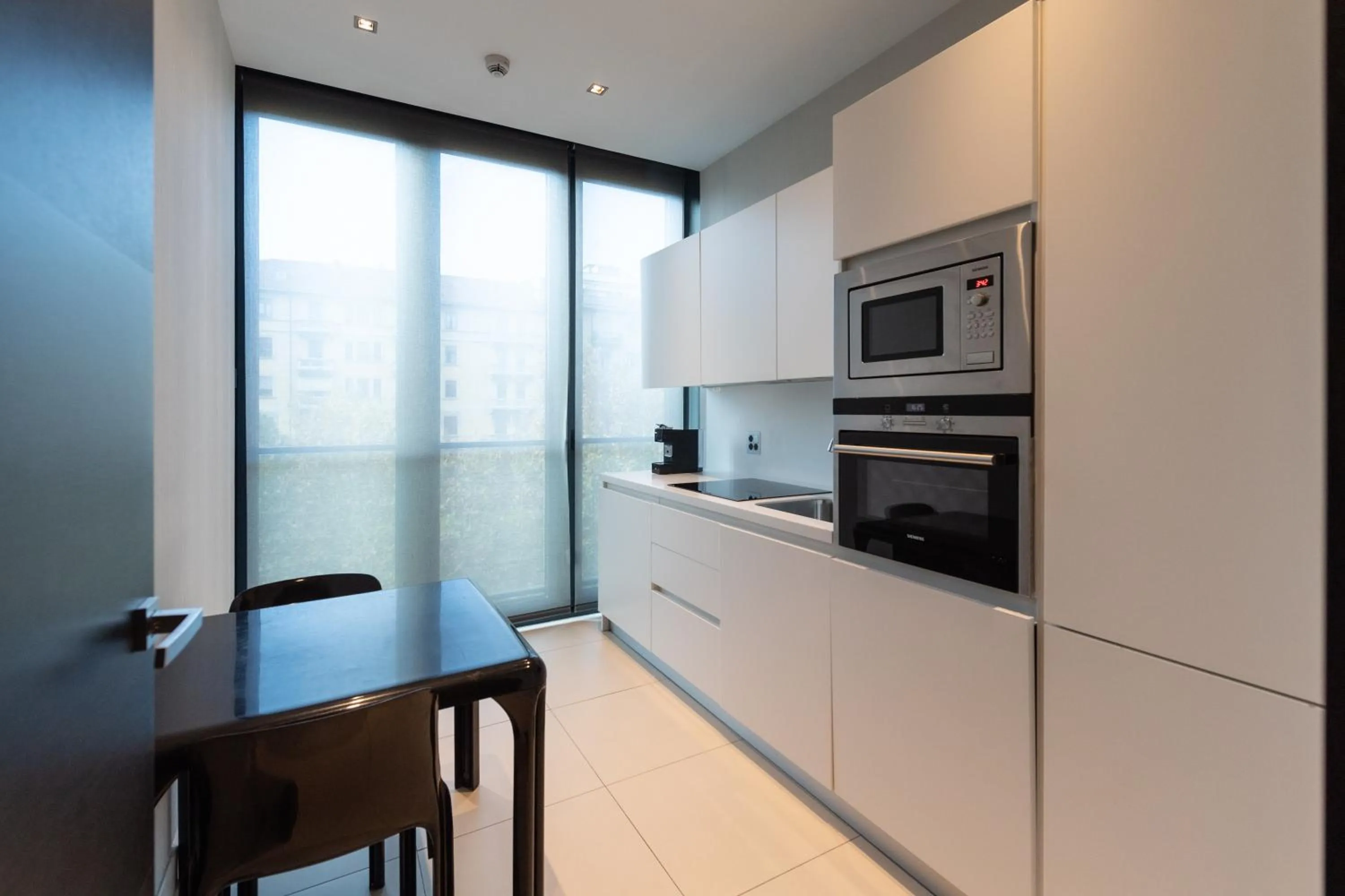 Kitchen or kitchenette in DUPARC Contemporary Suites