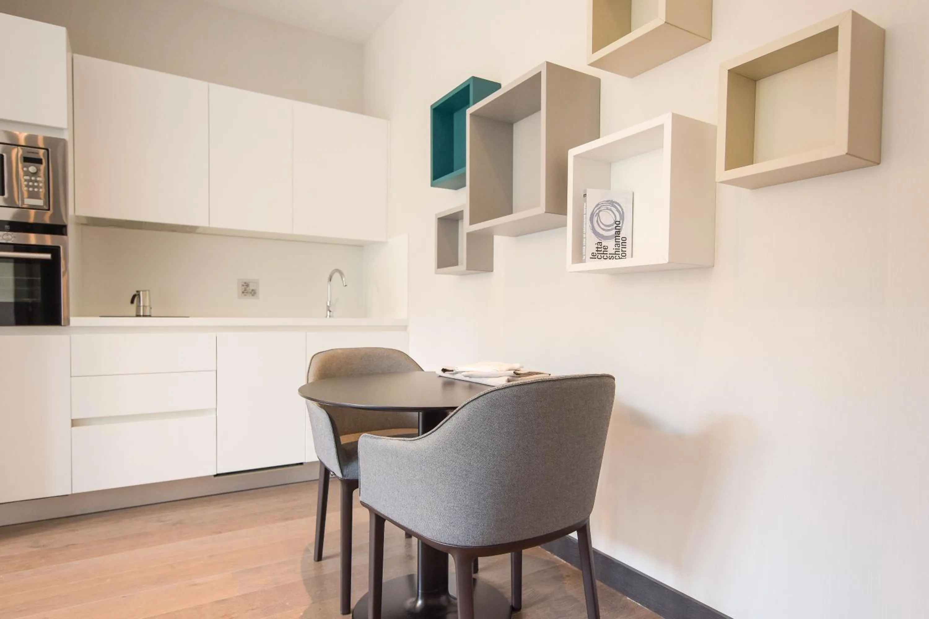 Kitchen or kitchenette in DUPARC Contemporary Suites