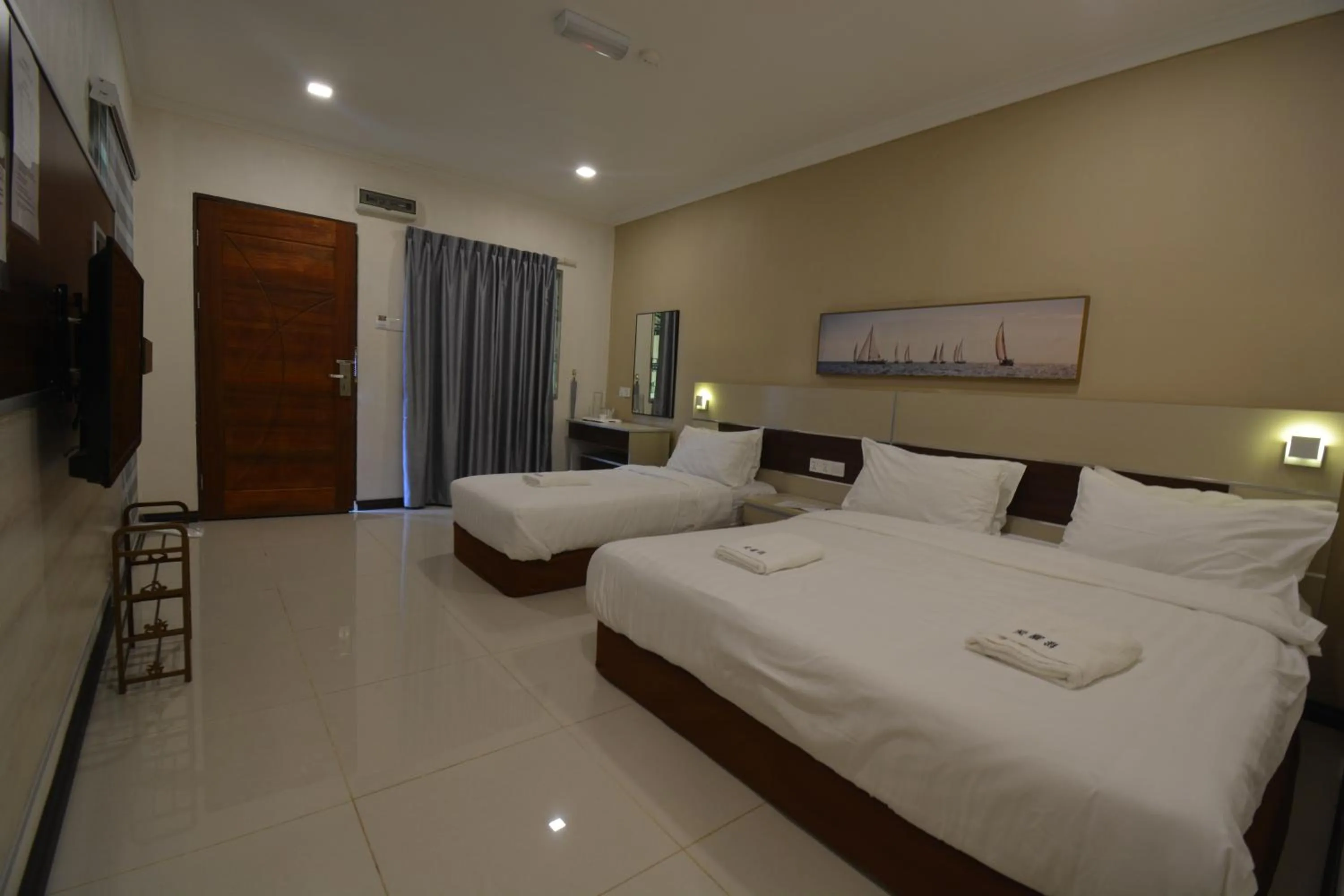 Bed in Hemingway Cottage 海明威度假屋