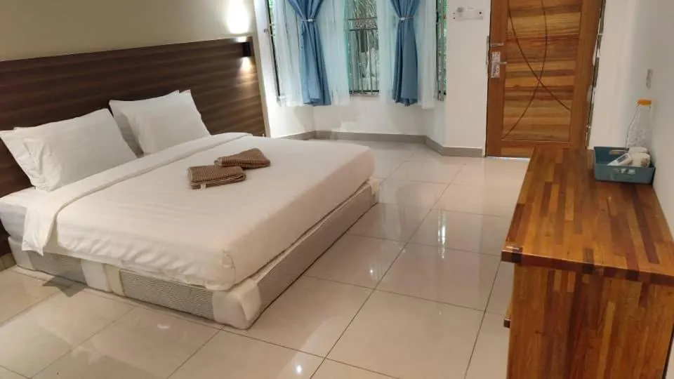 Bed in Hemingway Cottage 海明威度假屋