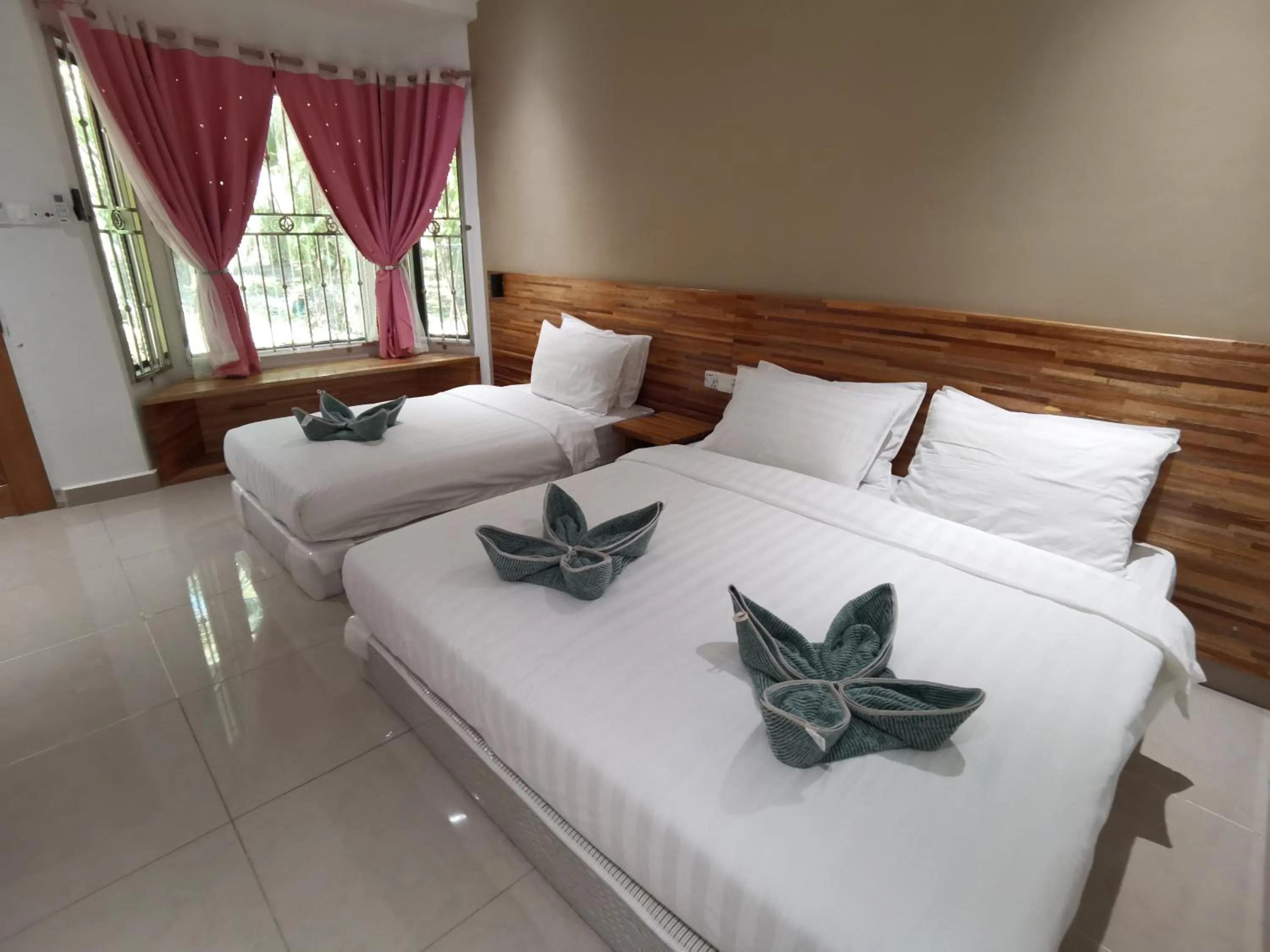 Bed in Hemingway Cottage 海明威度假屋