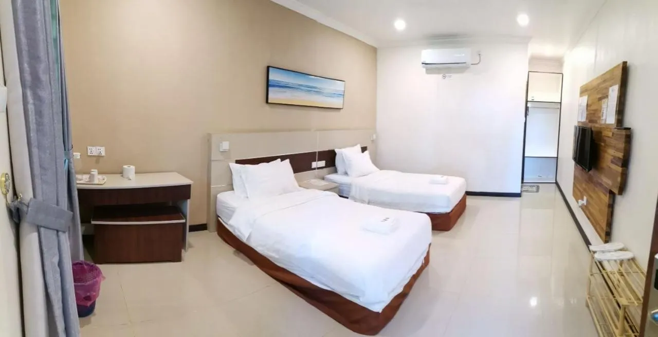 Bed in Hemingway Cottage 海明威度假屋