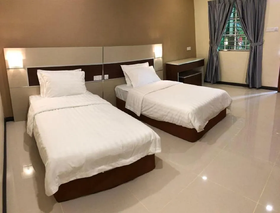 Bed in Hemingway Cottage 海明威度假屋