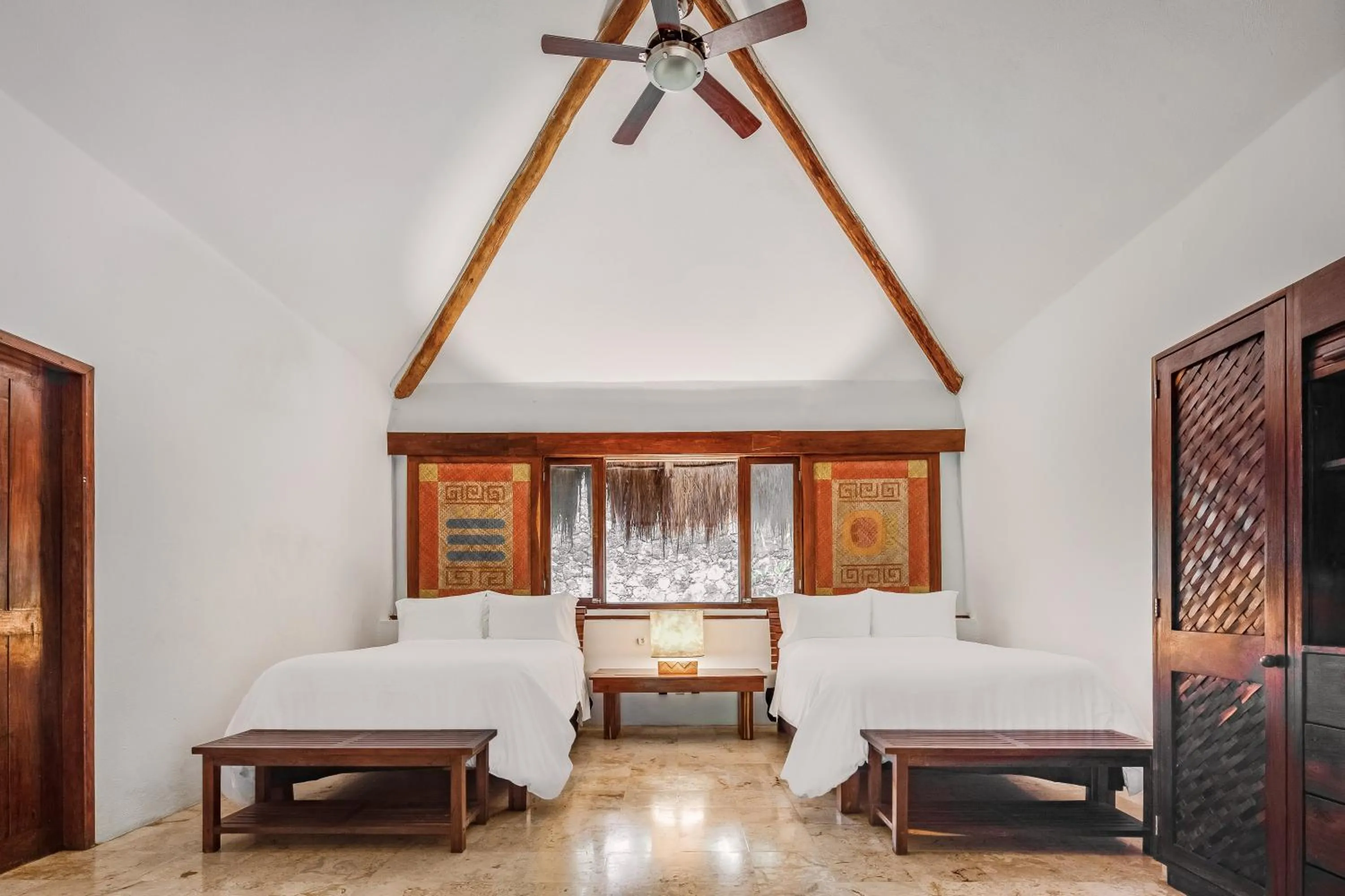 Photo of the whole room, Bed in The Explorean Selva Maya Kohunlich