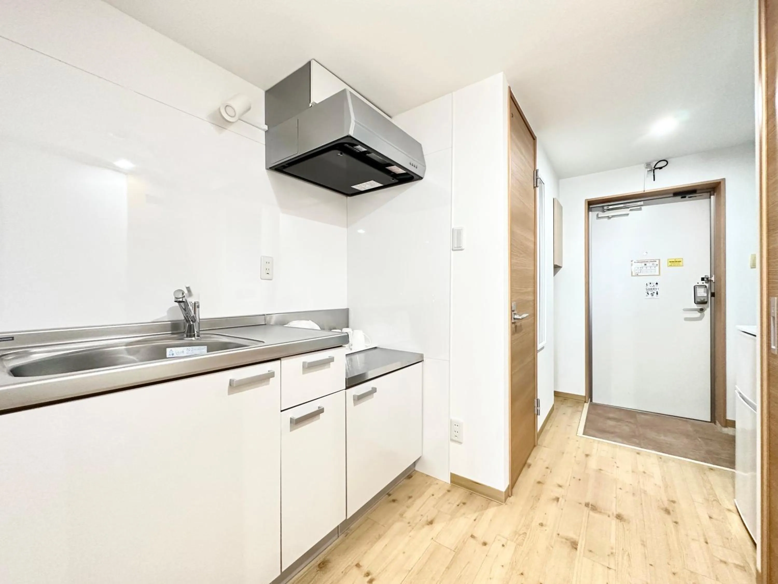 Kitchen or kitchenette in Hotel Miyakojima