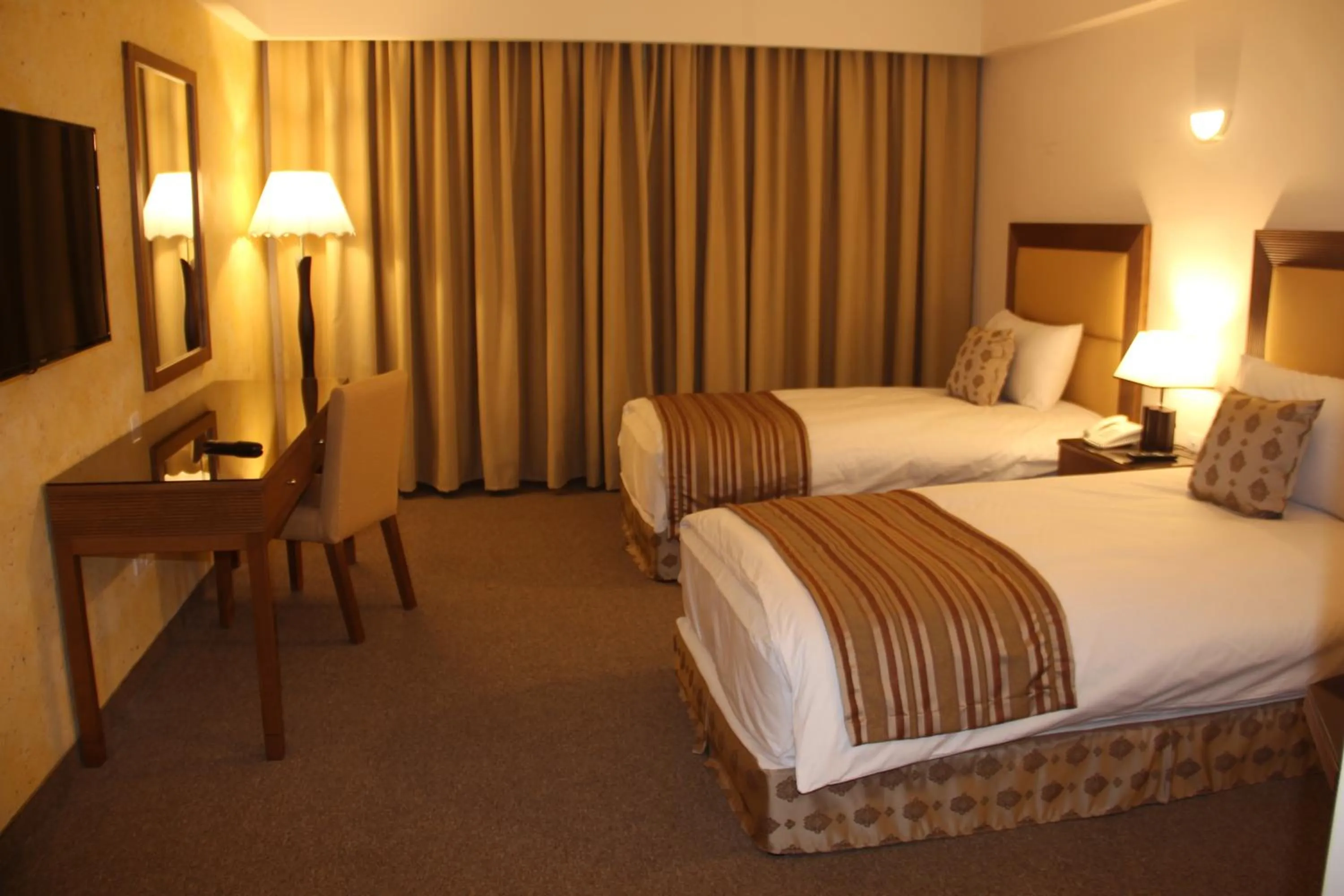 Bed in Saray Hotel Amman