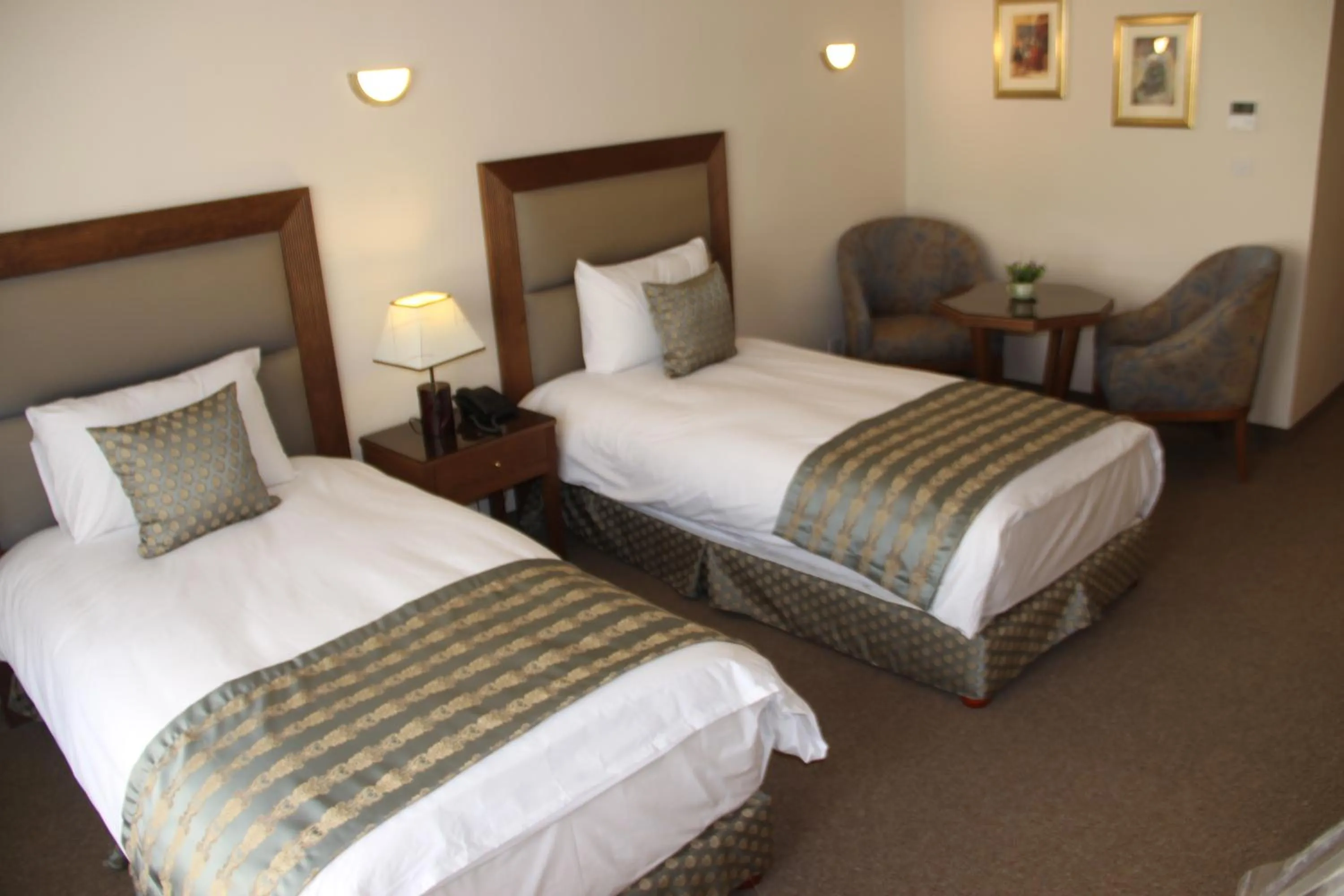 Bed in Saray Hotel Amman