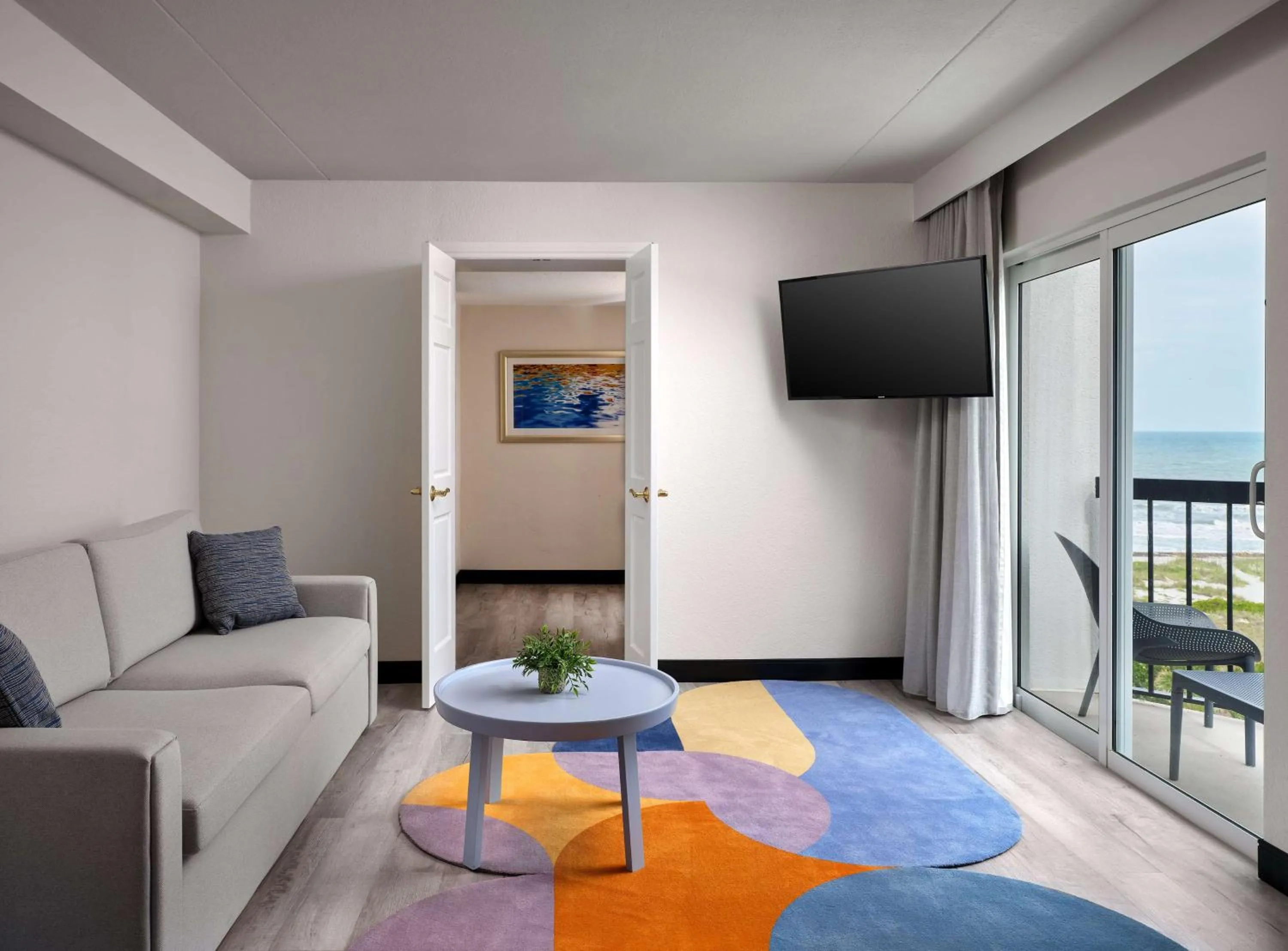 Living room in Hilton Garden Inn Cocoa Beach-Oceanfront, FL