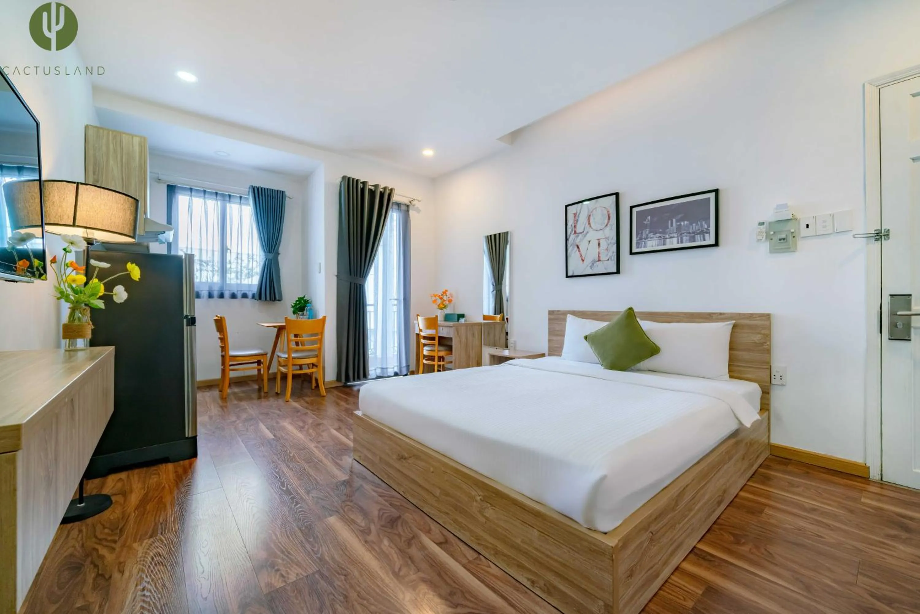 Bed in Cactusland Hotel & Apartment