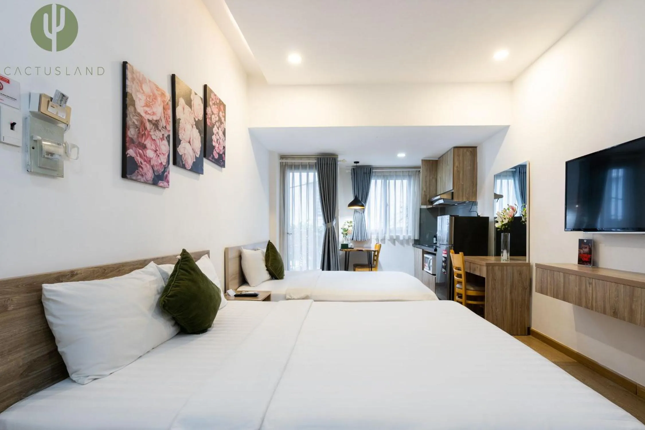 Bed in Cactusland Hotel & Apartment