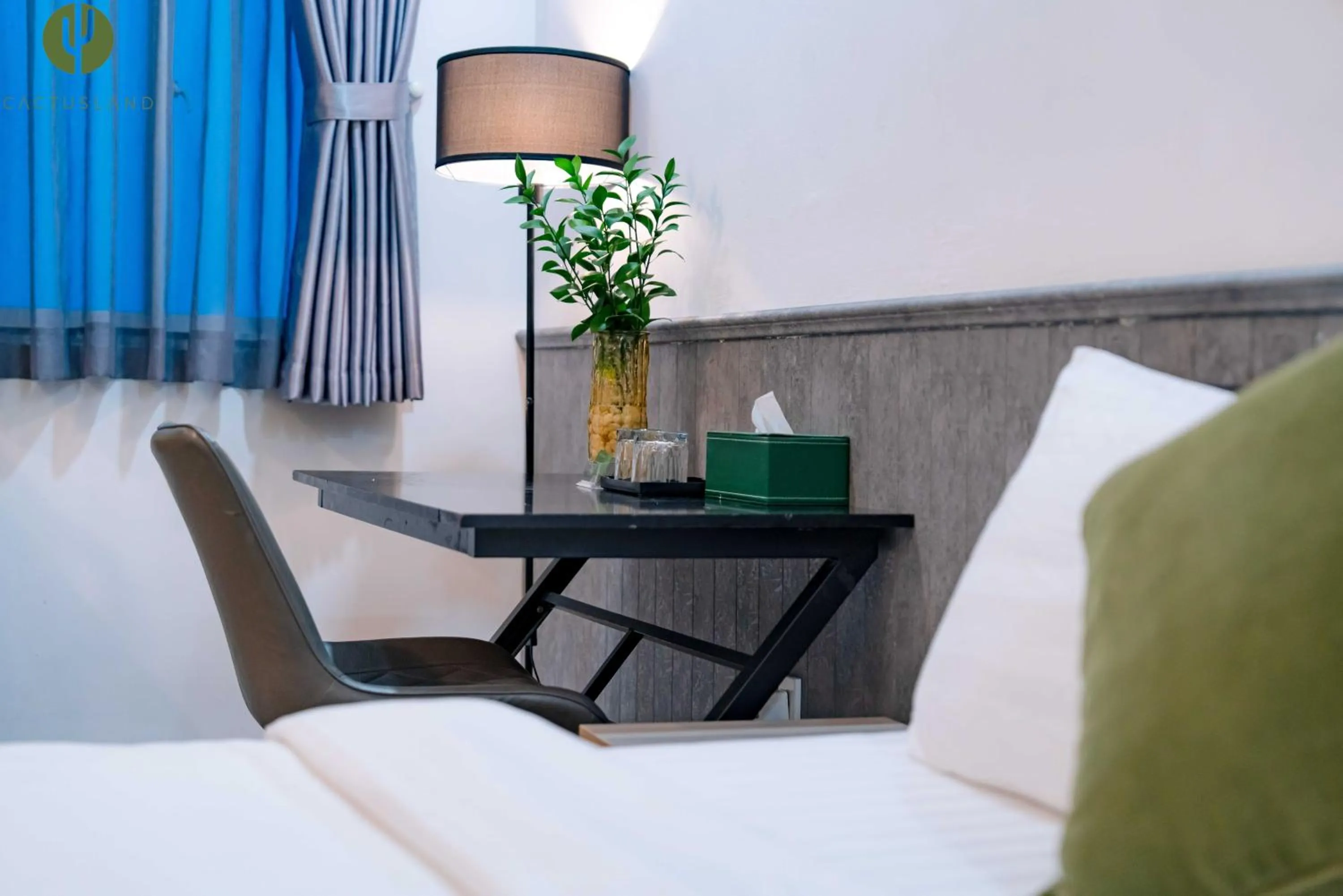 Bed in Cactusland Hotel & Apartment