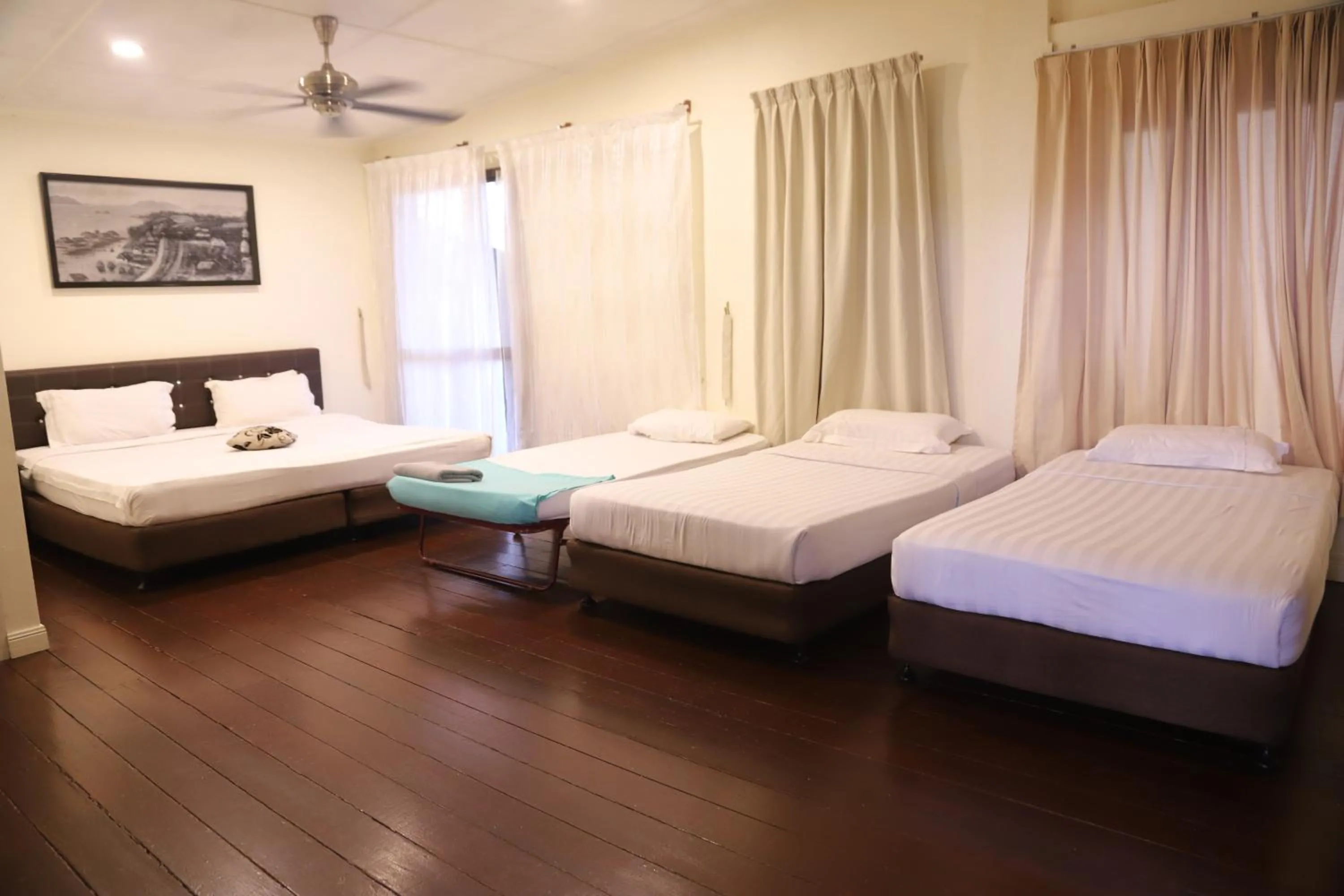 Bed in Kasih Sayang Hill Resort