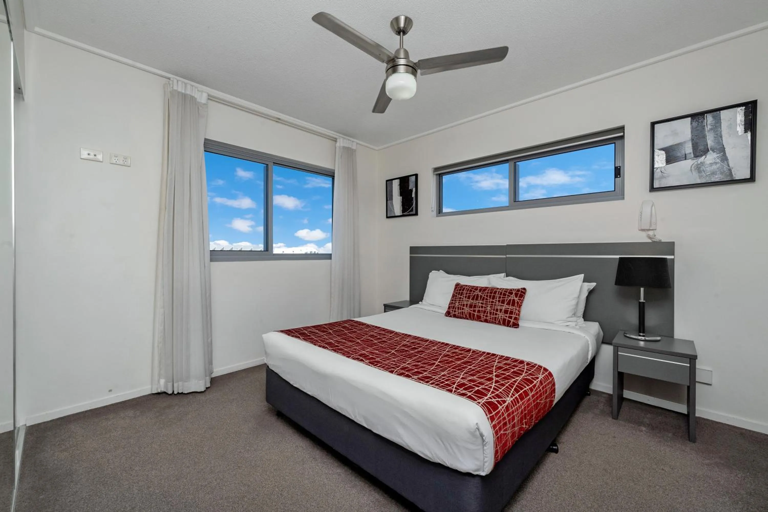 Bed in Central Kensington Apartments