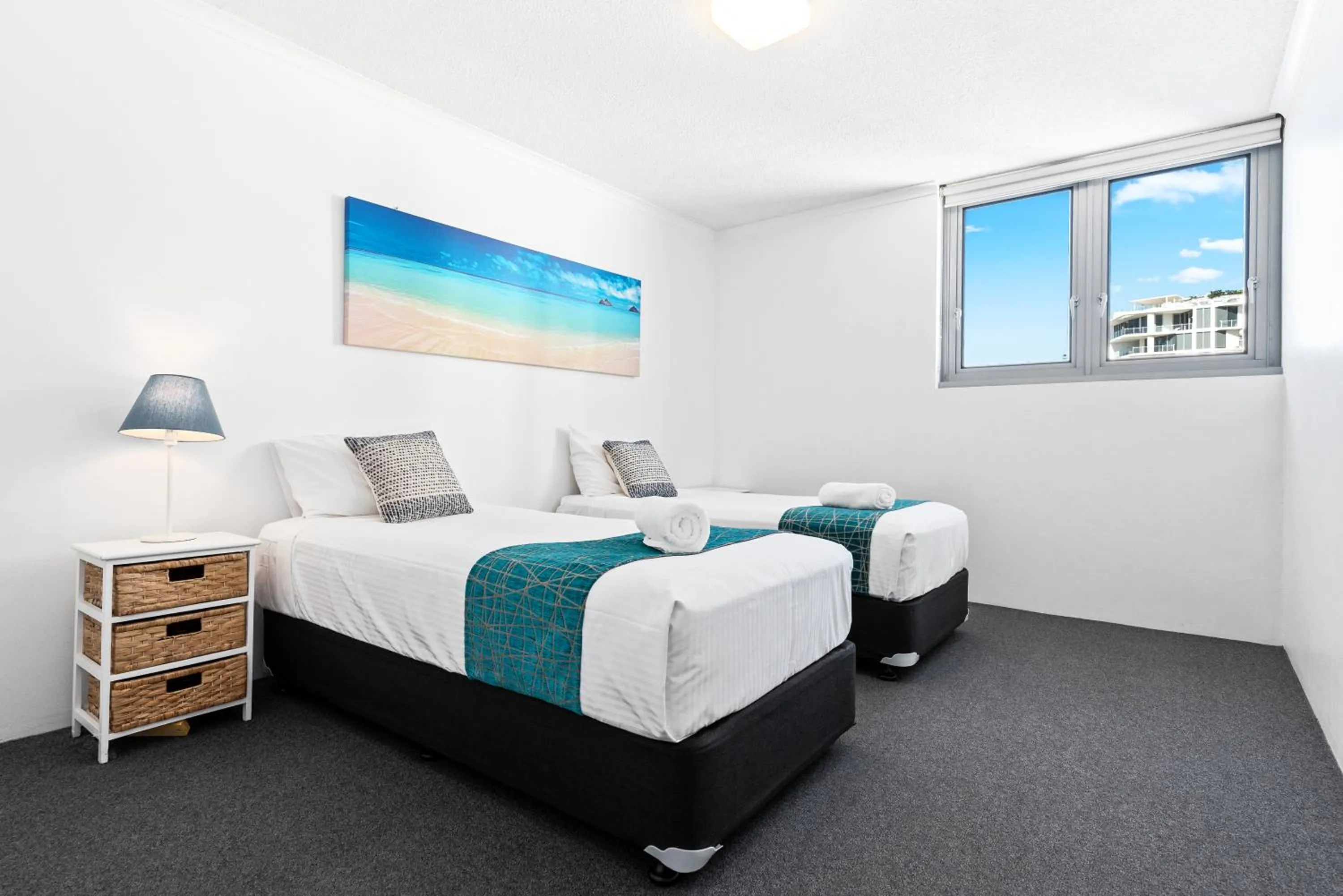 Bed in Northwind Beachfront Apartments