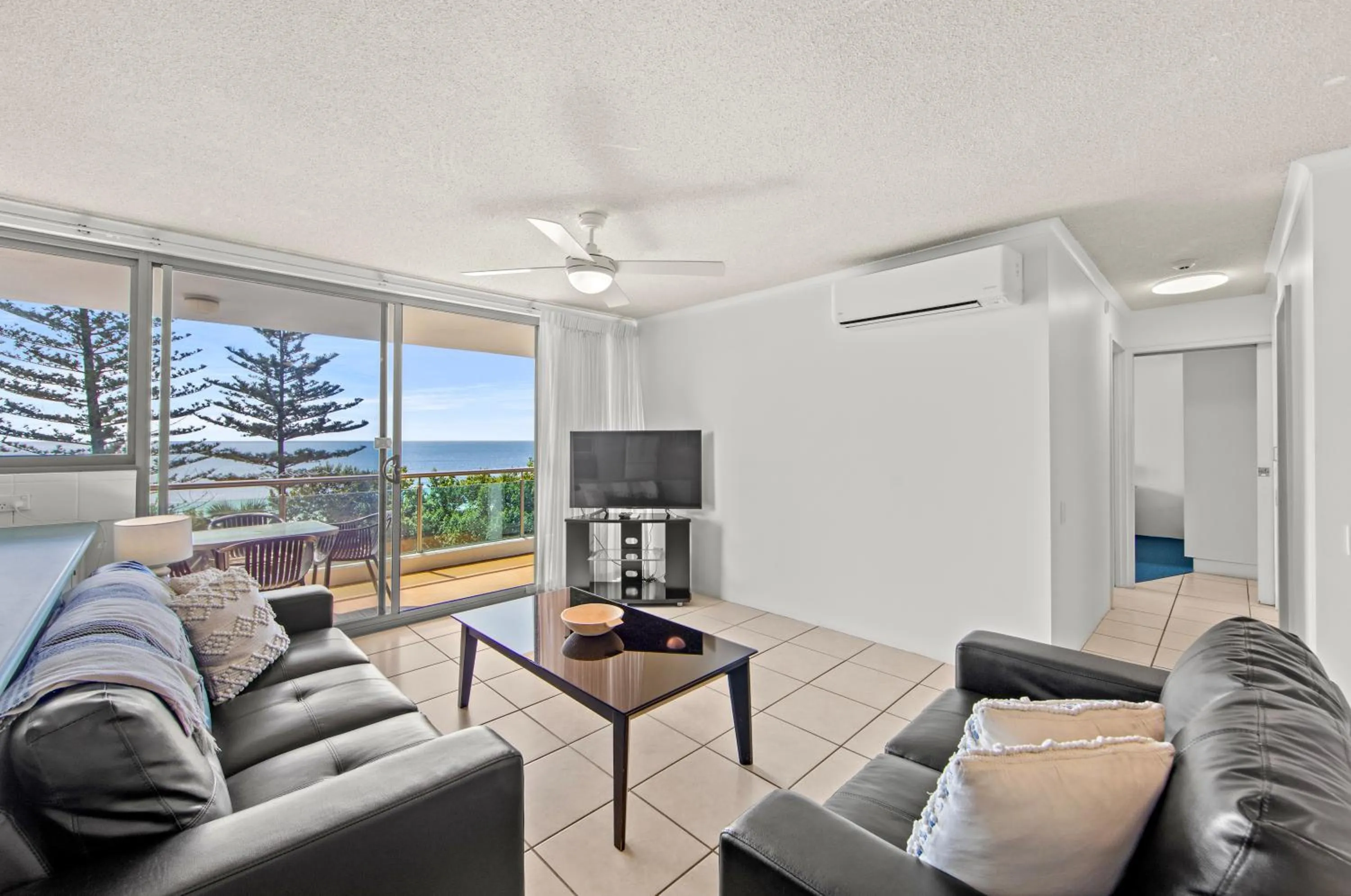 Living room in Northwind Beachfront Apartments