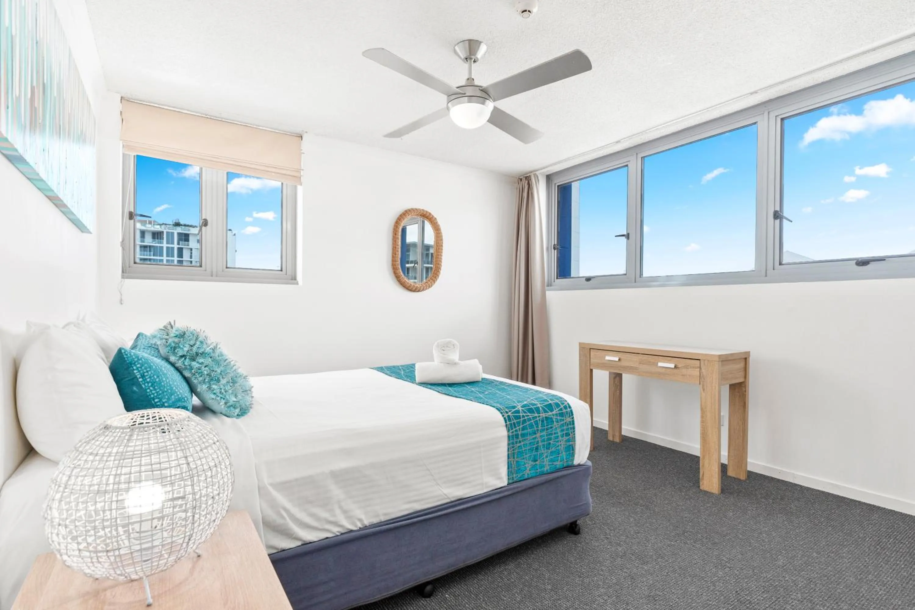 Bed in Northwind Beachfront Apartments