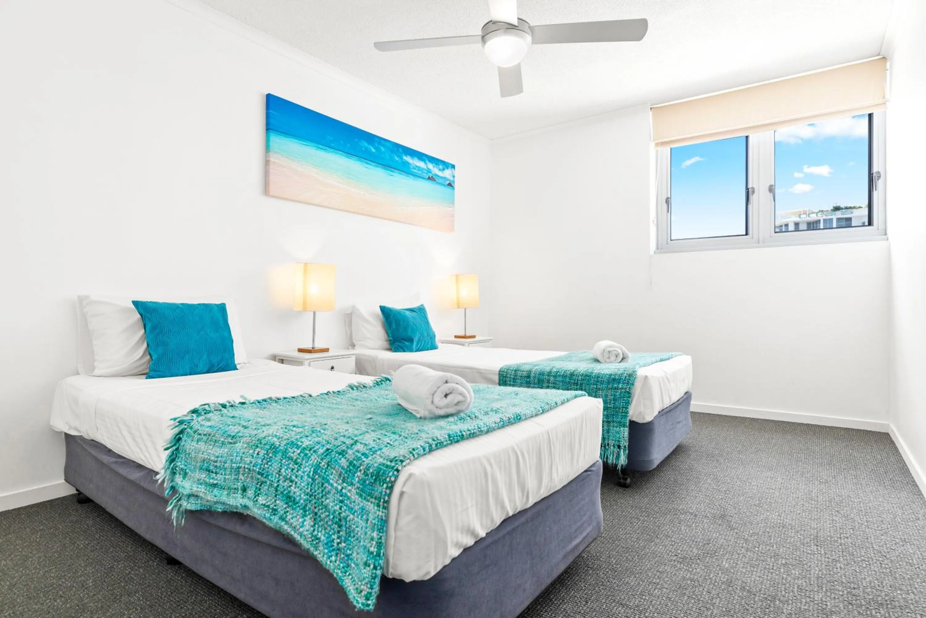 Bed in Northwind Beachfront Apartments