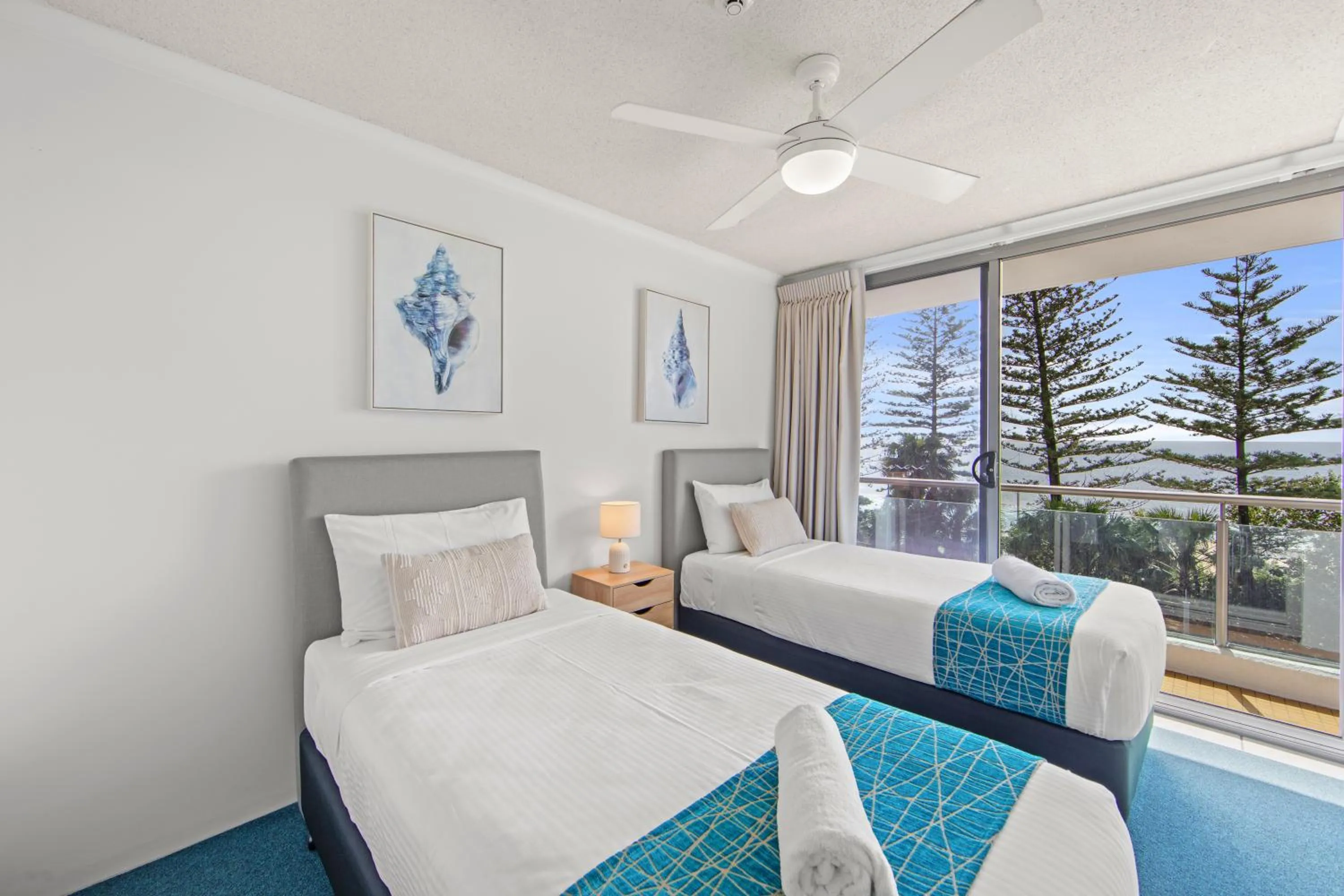 Bed in Northwind Beachfront Apartments