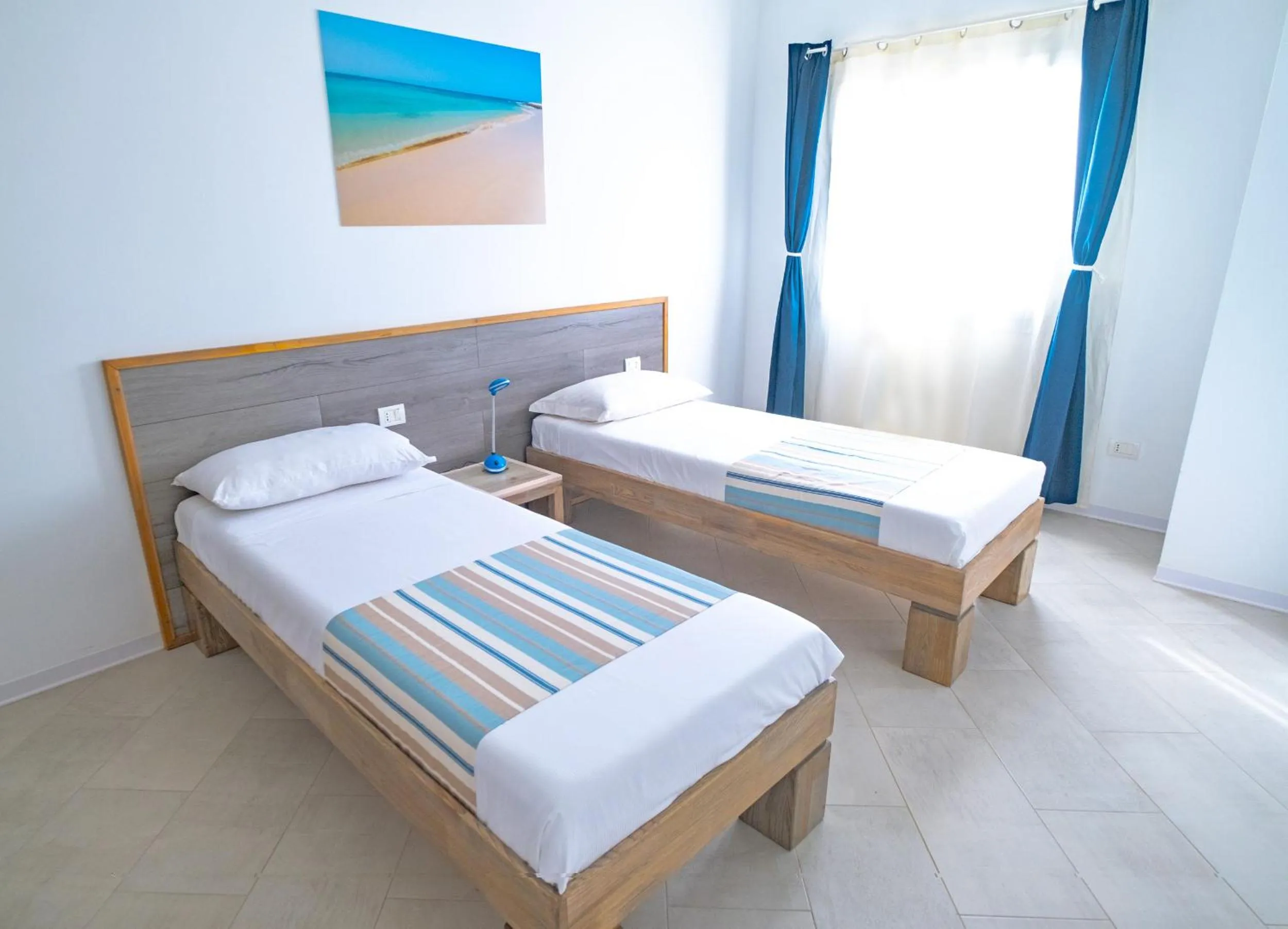 Bed in Halos Casa Resort