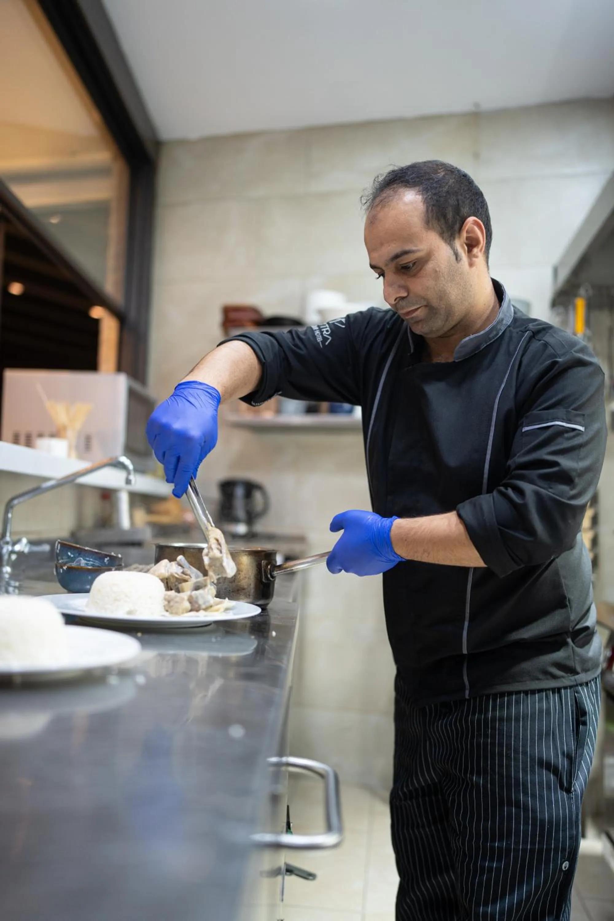 Kitchen or kitchenette in Petra Boutique Hotel