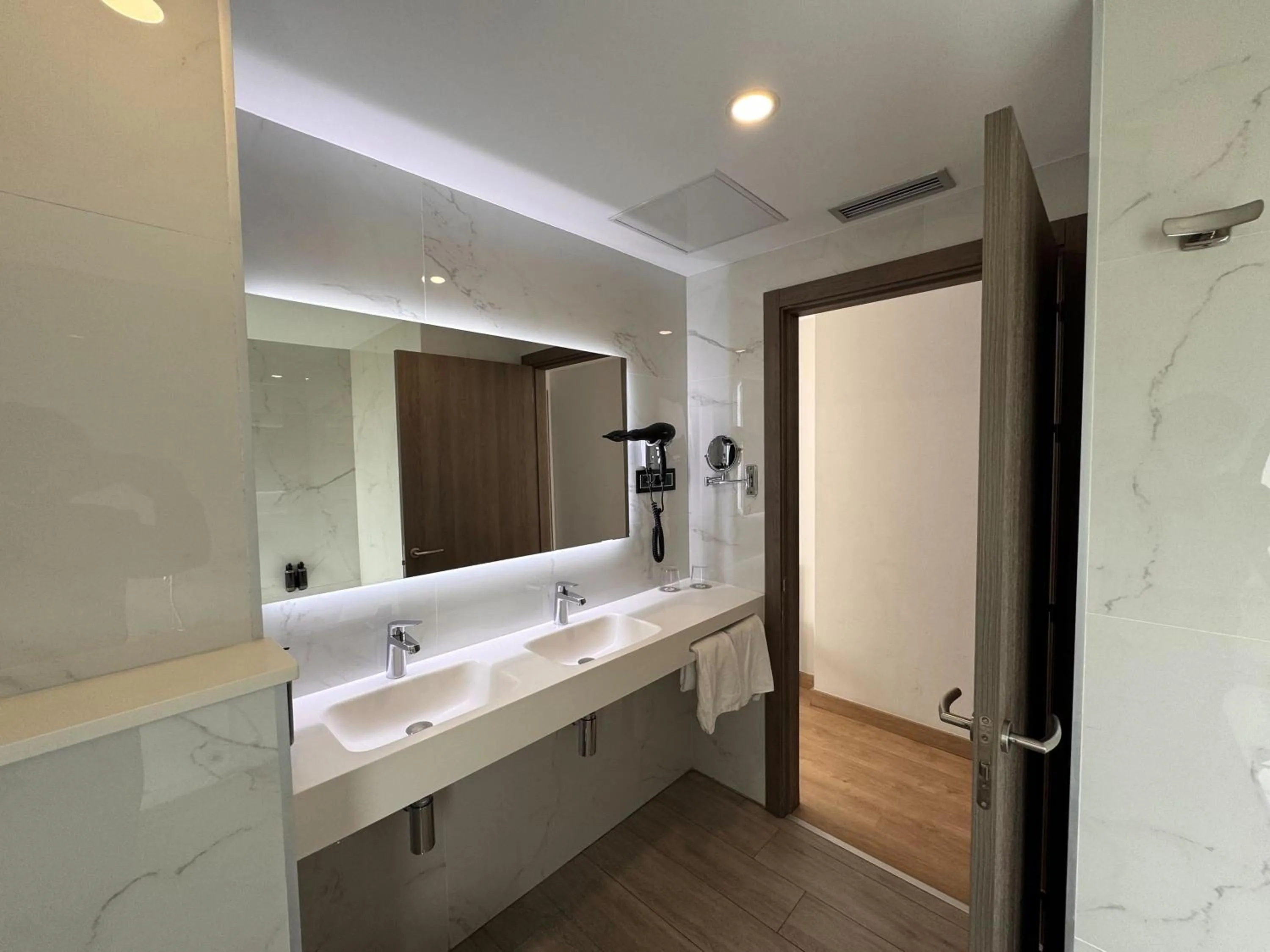 Bathroom in Playa de Foz Hotel & Spa by gaiarooms