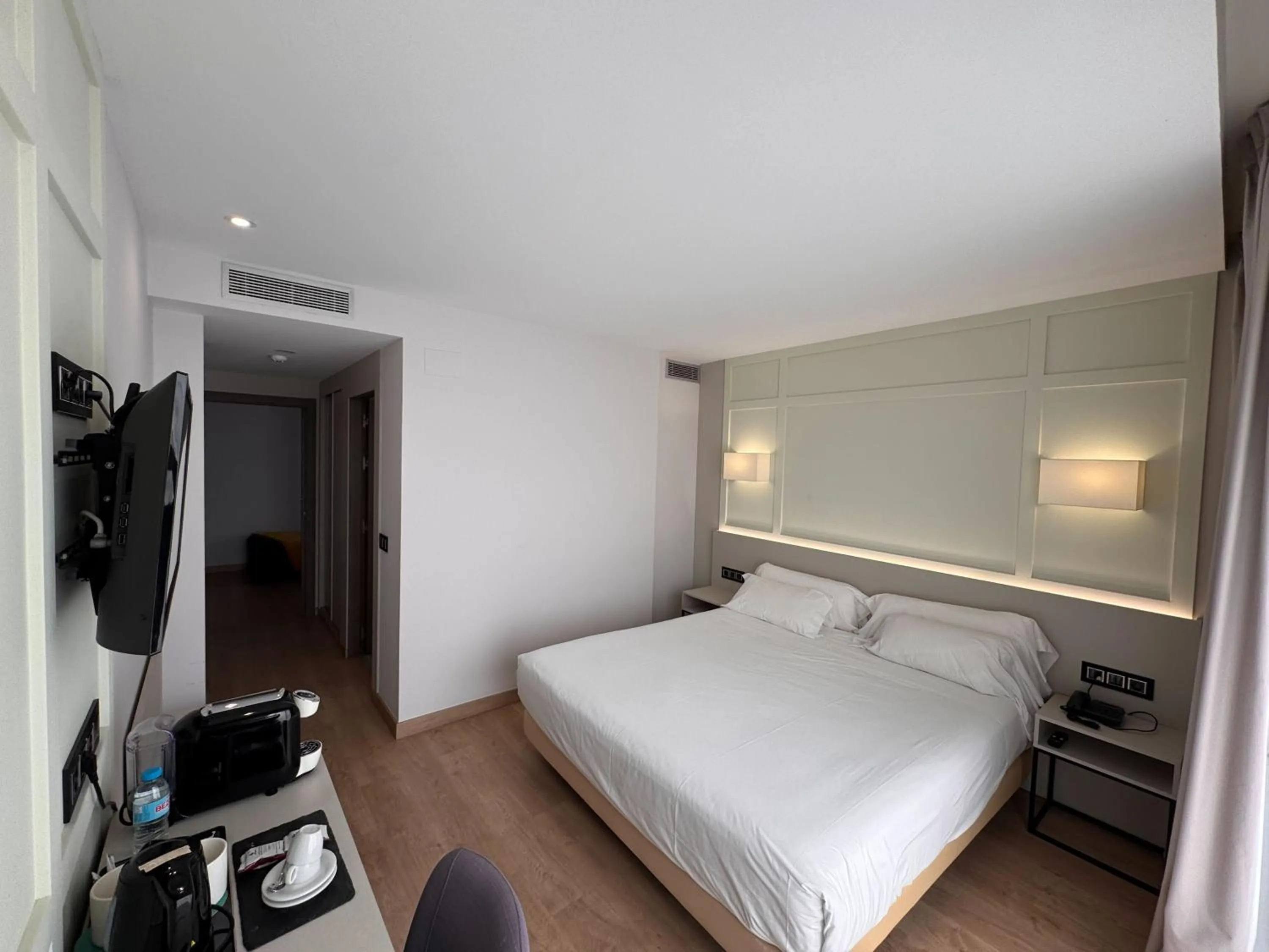 Photo of the whole room, Bed in Playa de Foz Hotel & Spa by gaiarooms