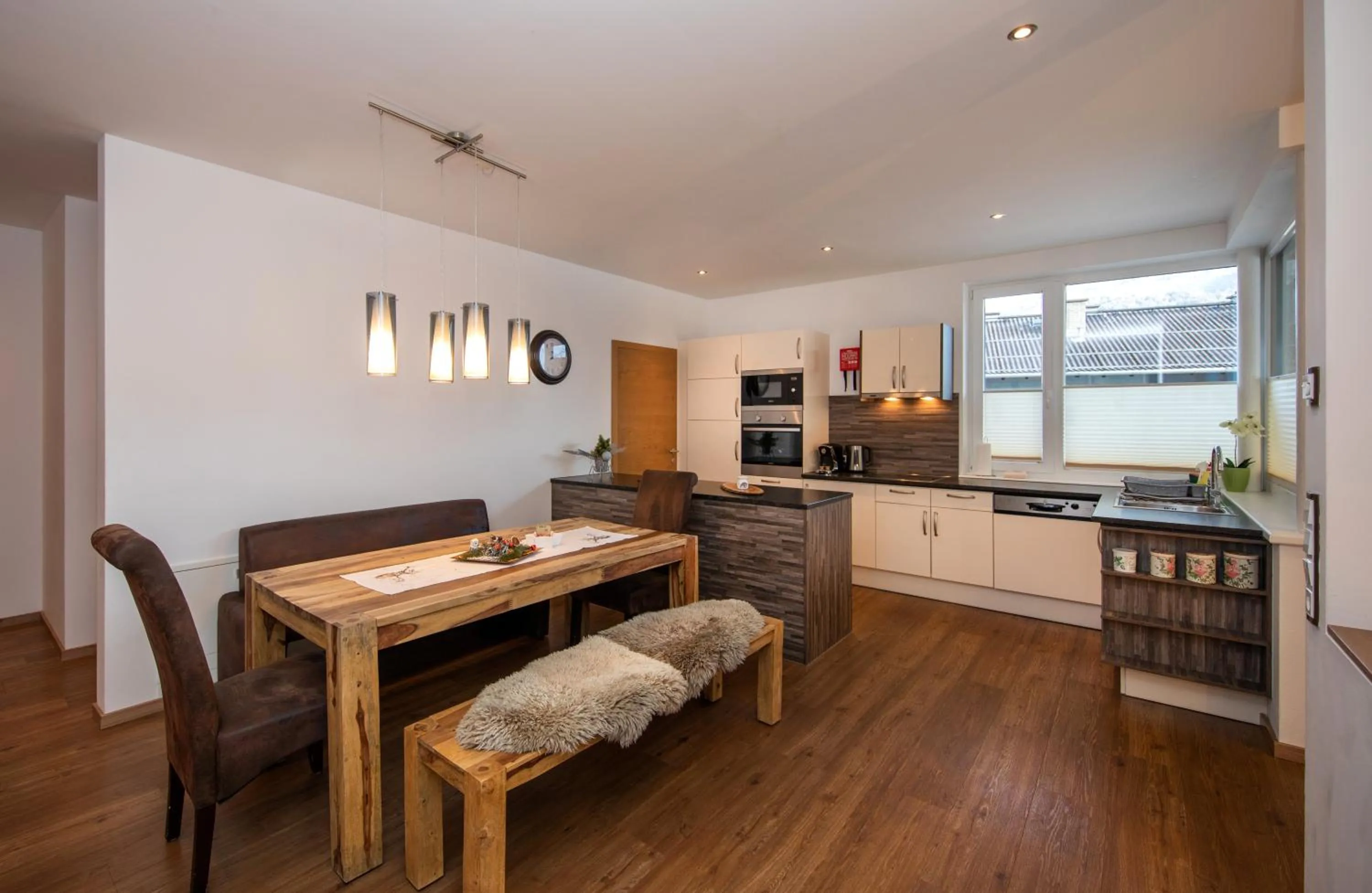 Kitchen or kitchenette in Appartement Living Schönwies apartments with private Infrared cabin and Zell am See Kaprun summercard