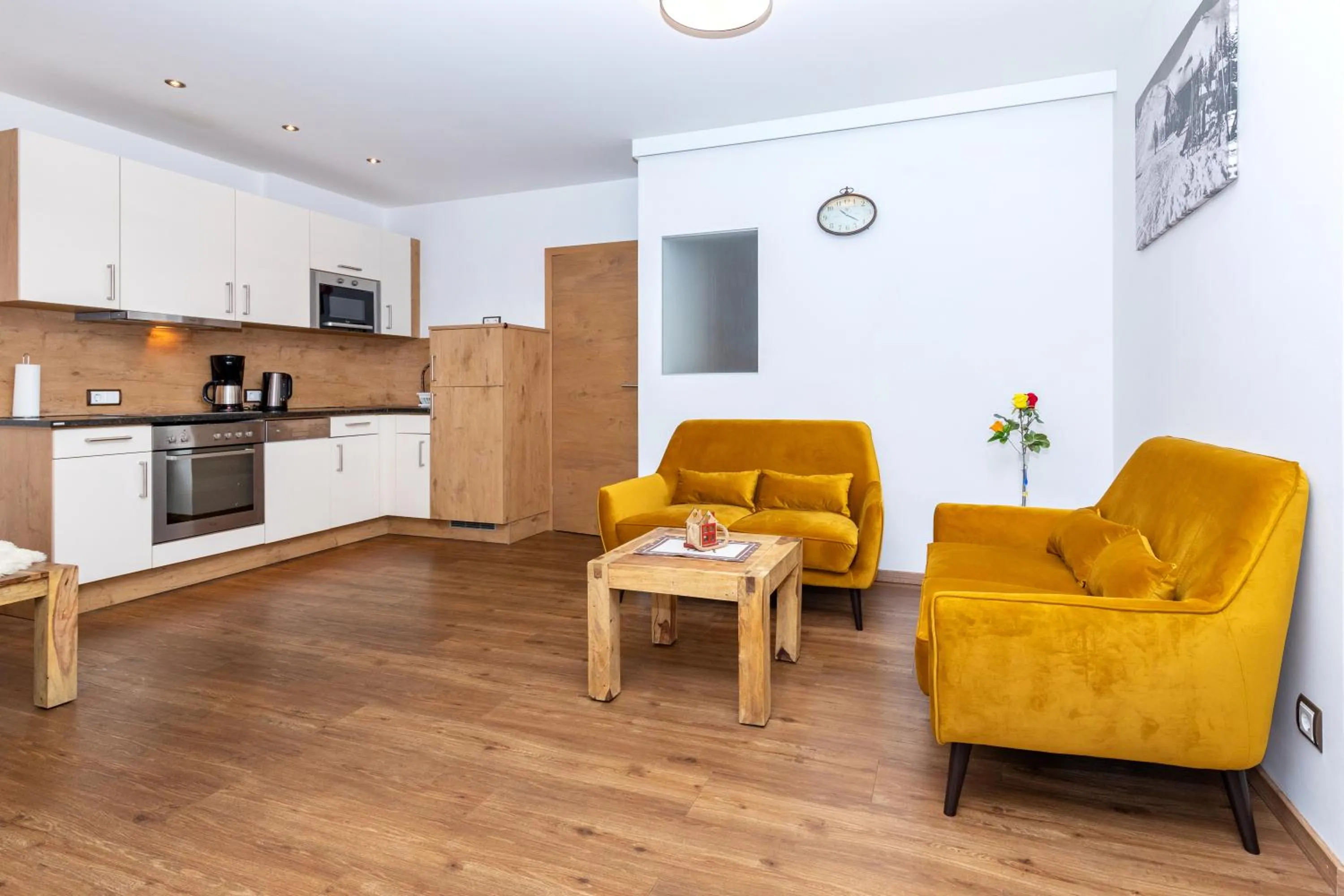 Kitchen or kitchenette in Appartement Living Schönwies apartments with private Infrared cabin and Zell am See Kaprun summercard