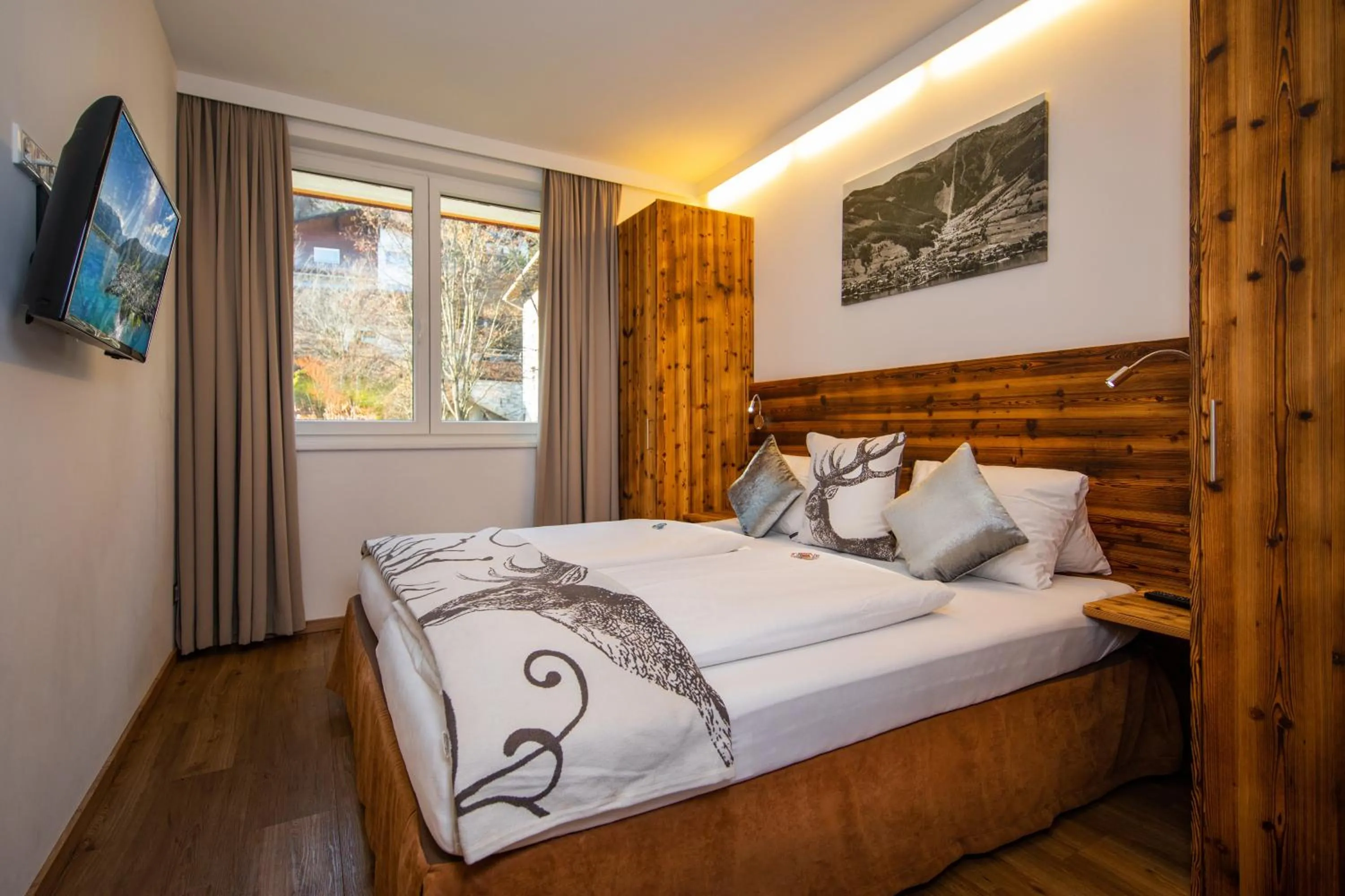 Bedroom, Bed in Appartement Living Schönwies apartments with private Infrared cabin and Zell am See Kaprun summercard