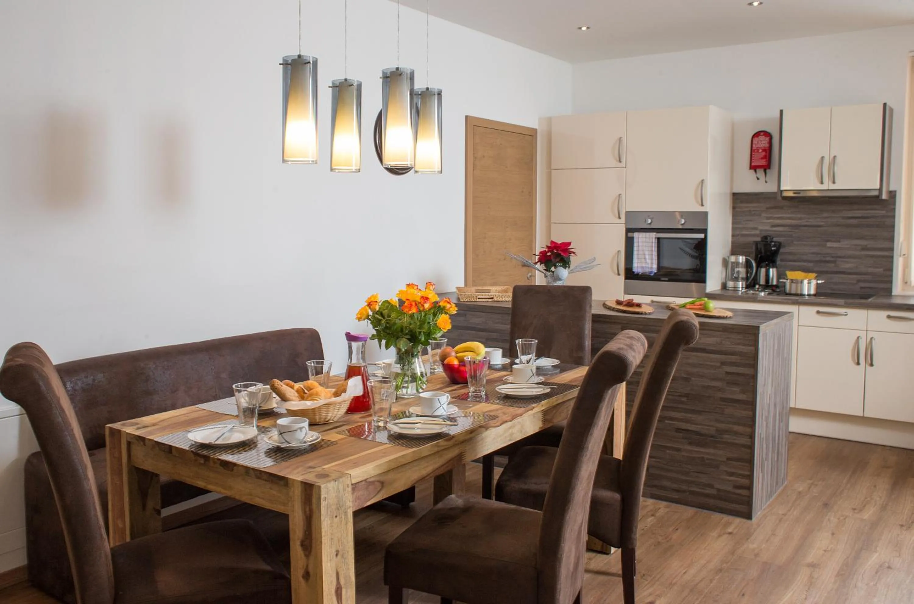Kitchen or kitchenette in Appartement Living Schönwies apartments with private Infrared cabin and Zell am See Kaprun summercard