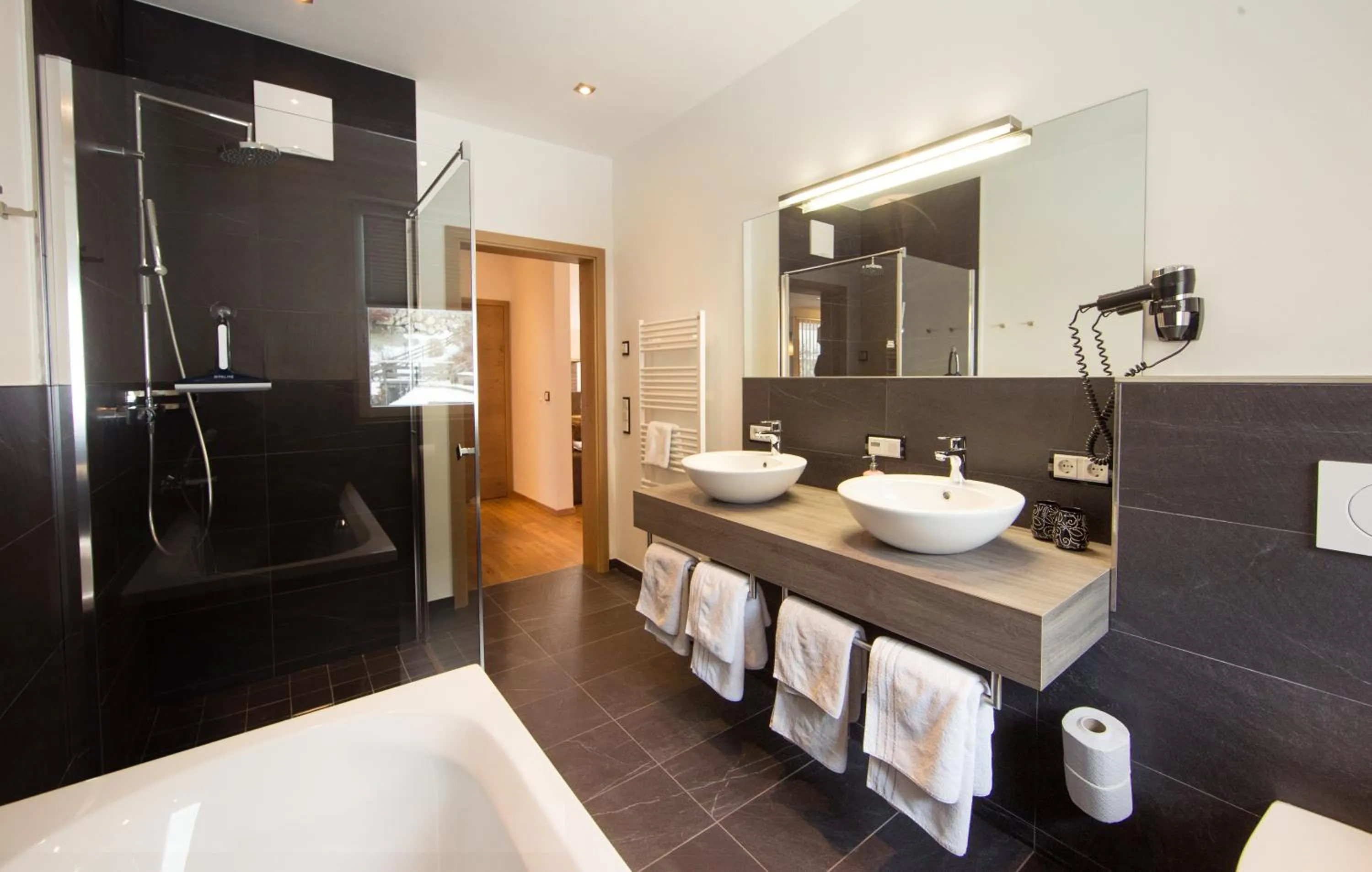 Shower in Appartement Living Schönwies apartments with private Infrared cabin and Zell am See Kaprun summercard