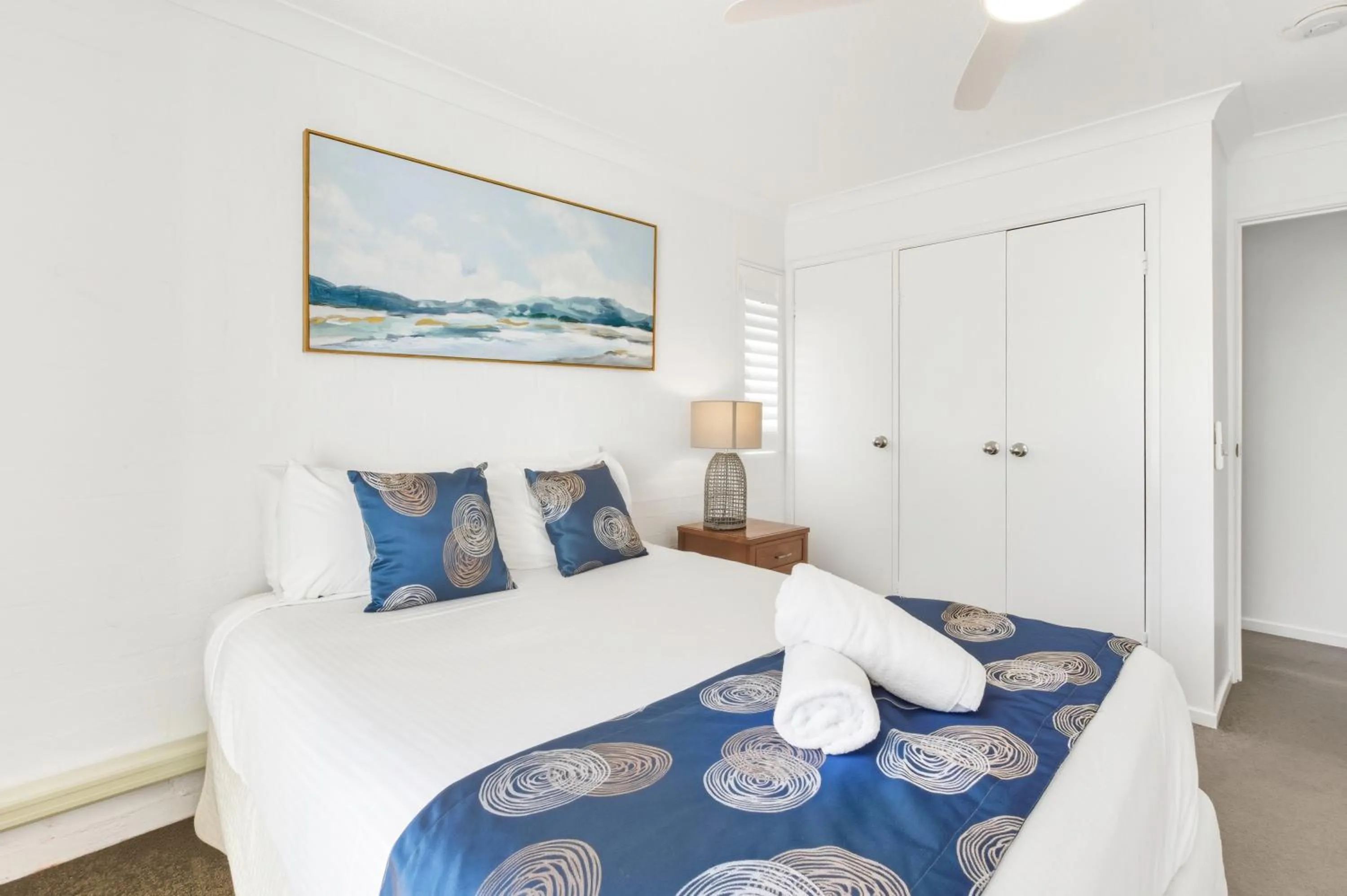 Bed in Osprey Apartments