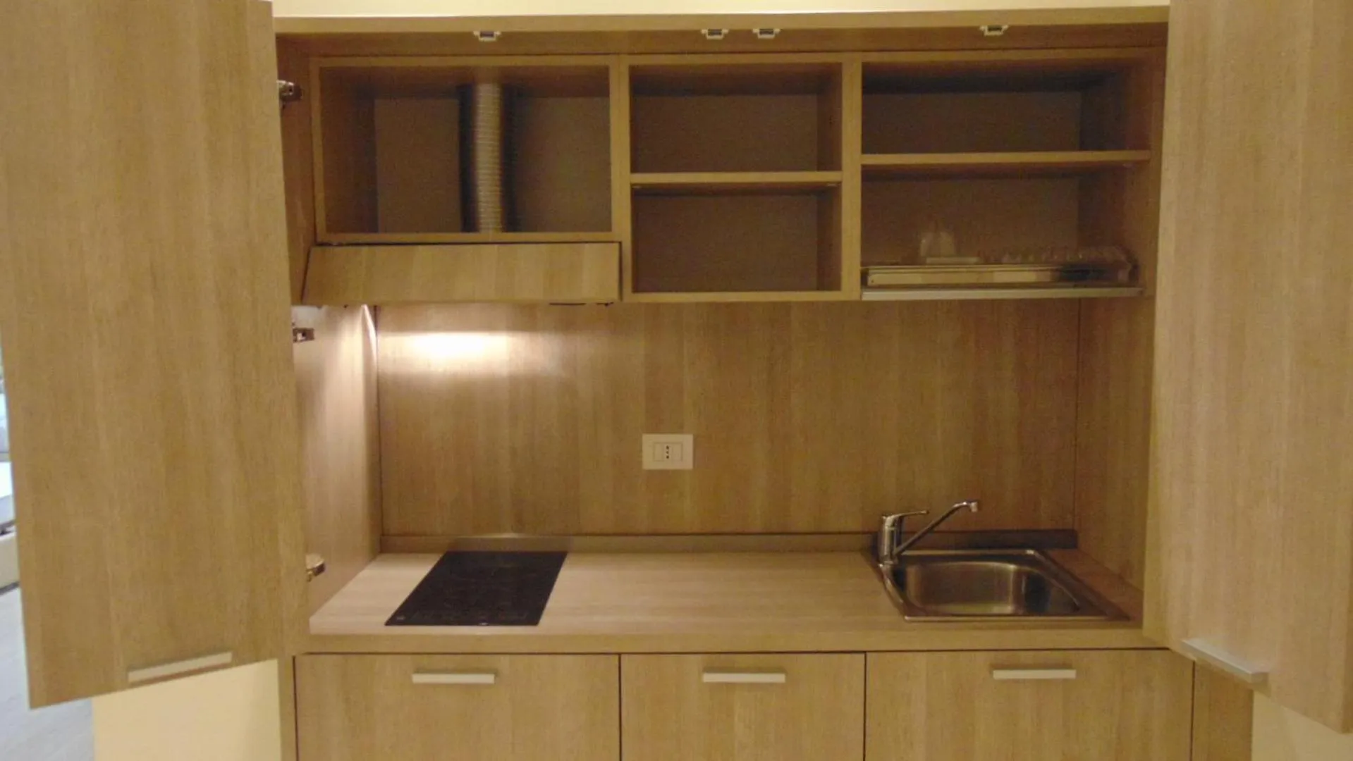 Kitchen or kitchenette in Turin Airport Hotel & Residence