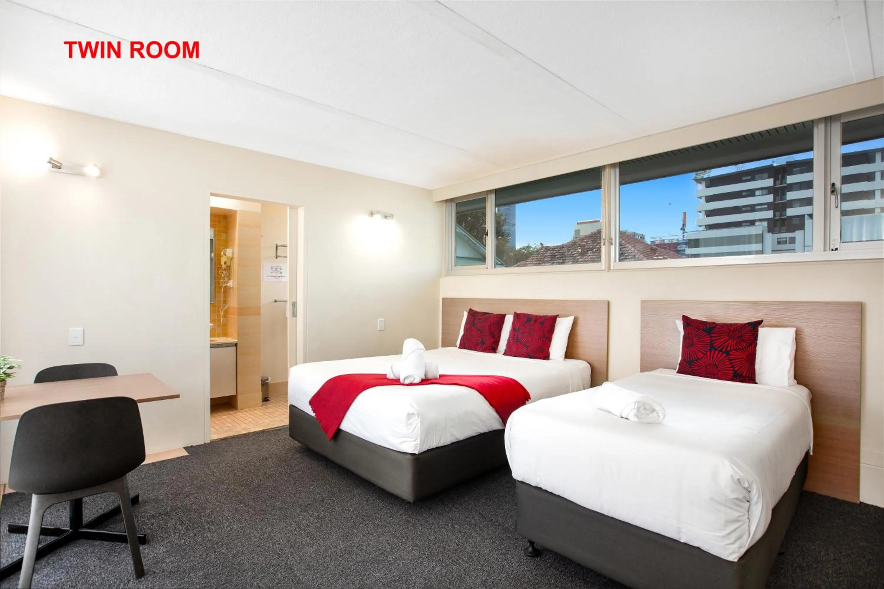 Photo of the whole room, Bed in City Star Lodge