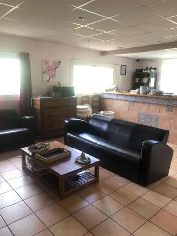 Communal lounge/ TV room in Hotel L'Oustau de la Font