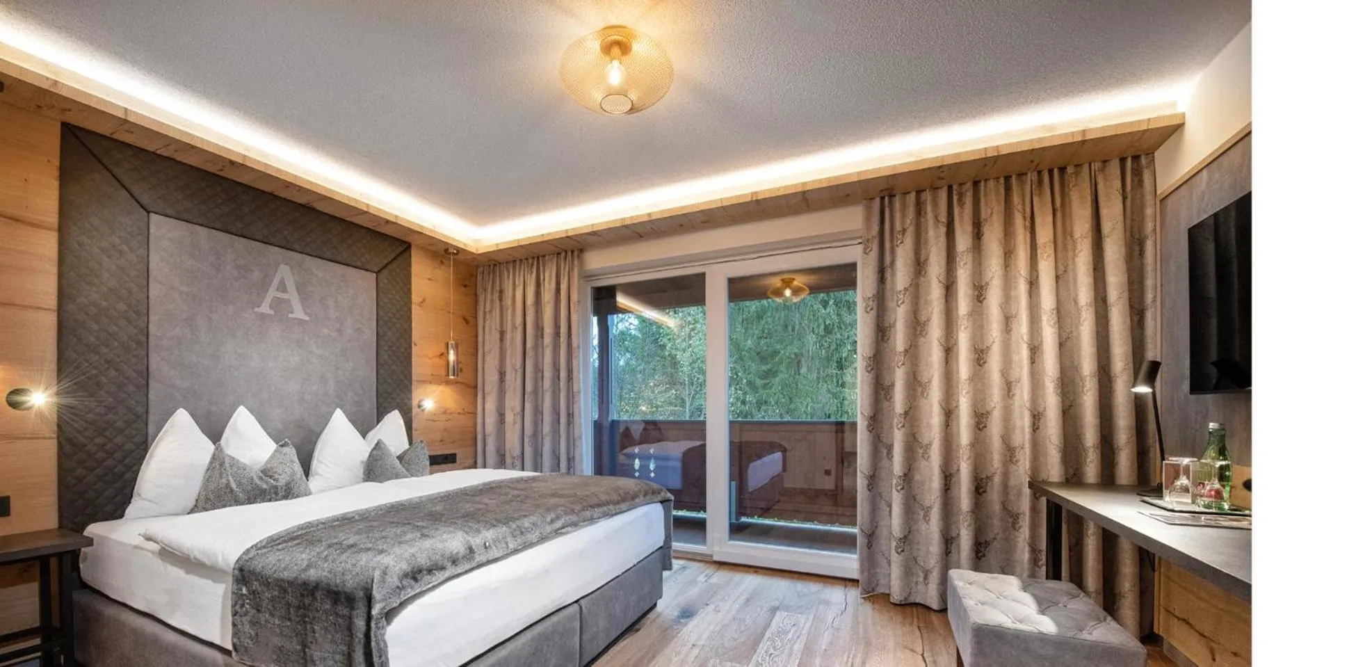 Bed in Hotel Alpina Wellness & Spa Resort