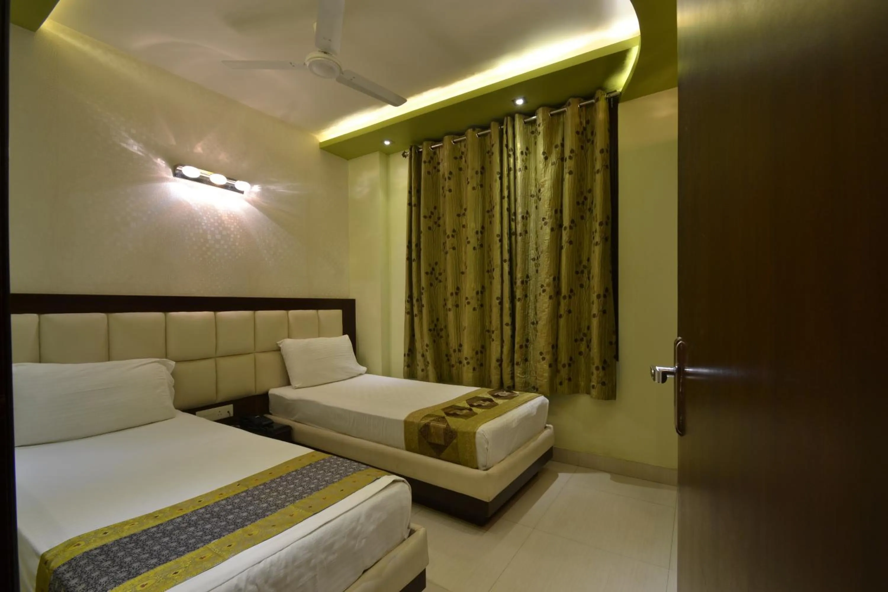 Photo of the whole room, Bed in Hotel Central Residency