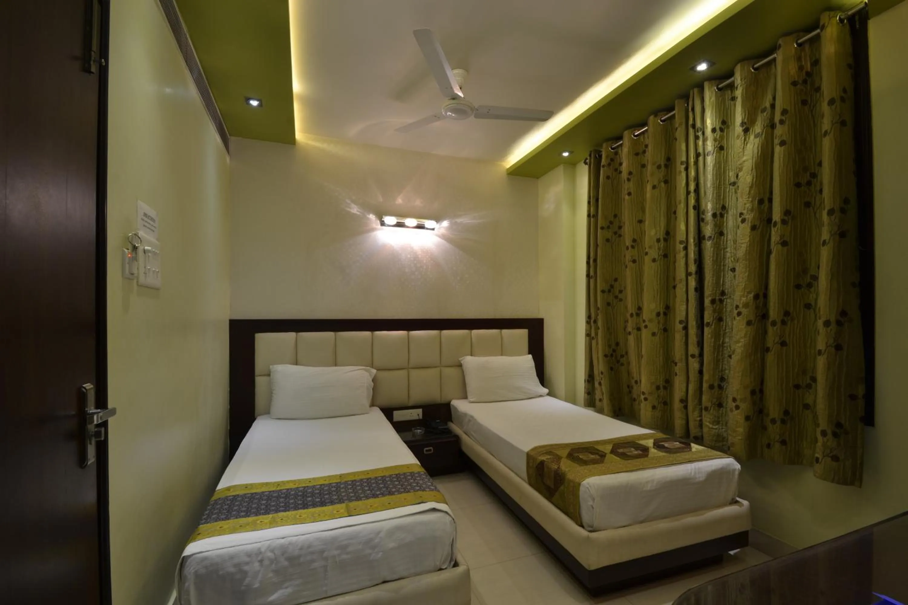 Photo of the whole room, Bed in Hotel Central Residency